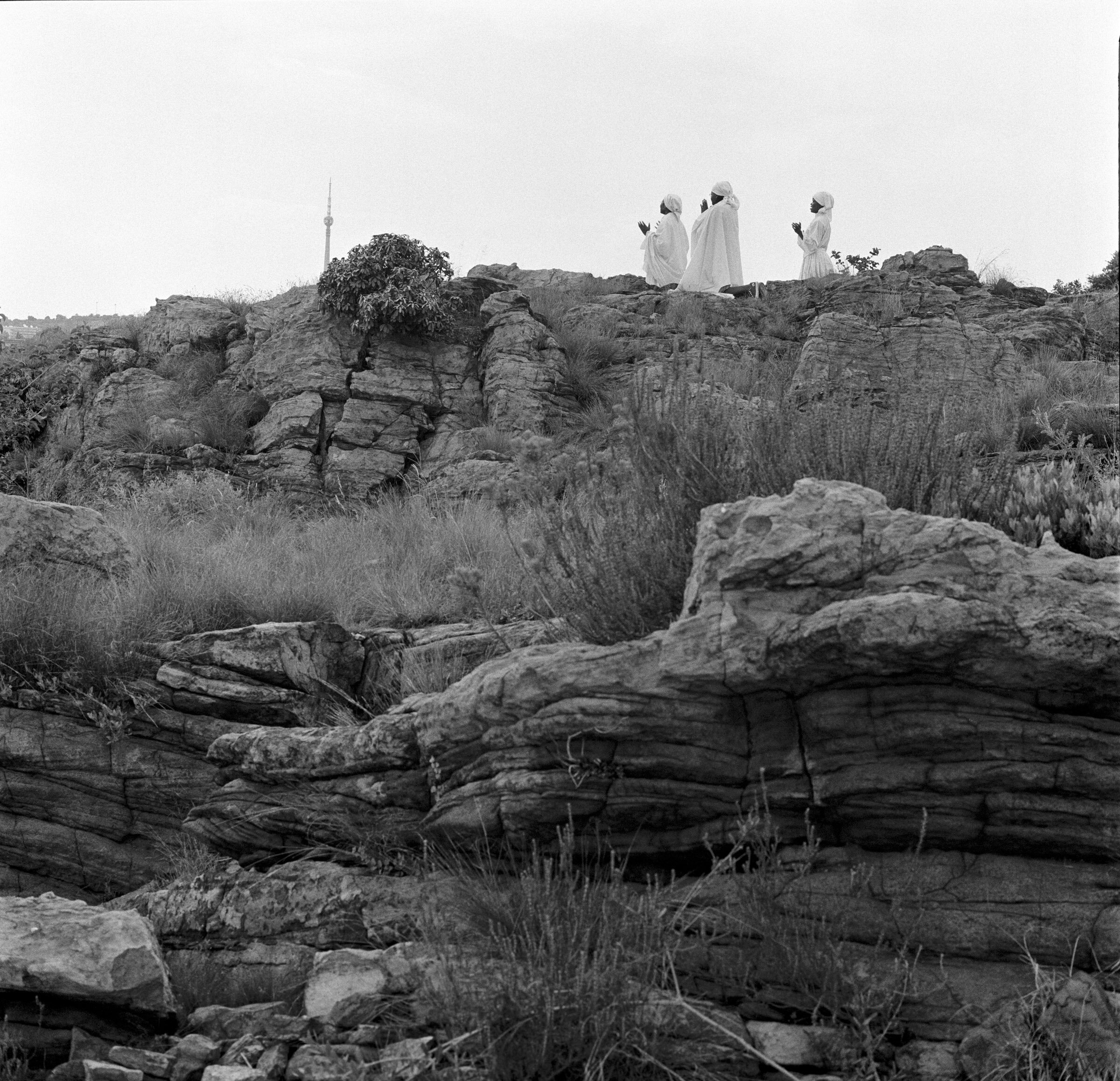  Zioni women pray atop a rock at Melville Koppies, Johannesburg 2007. photo Greg Marinovich 