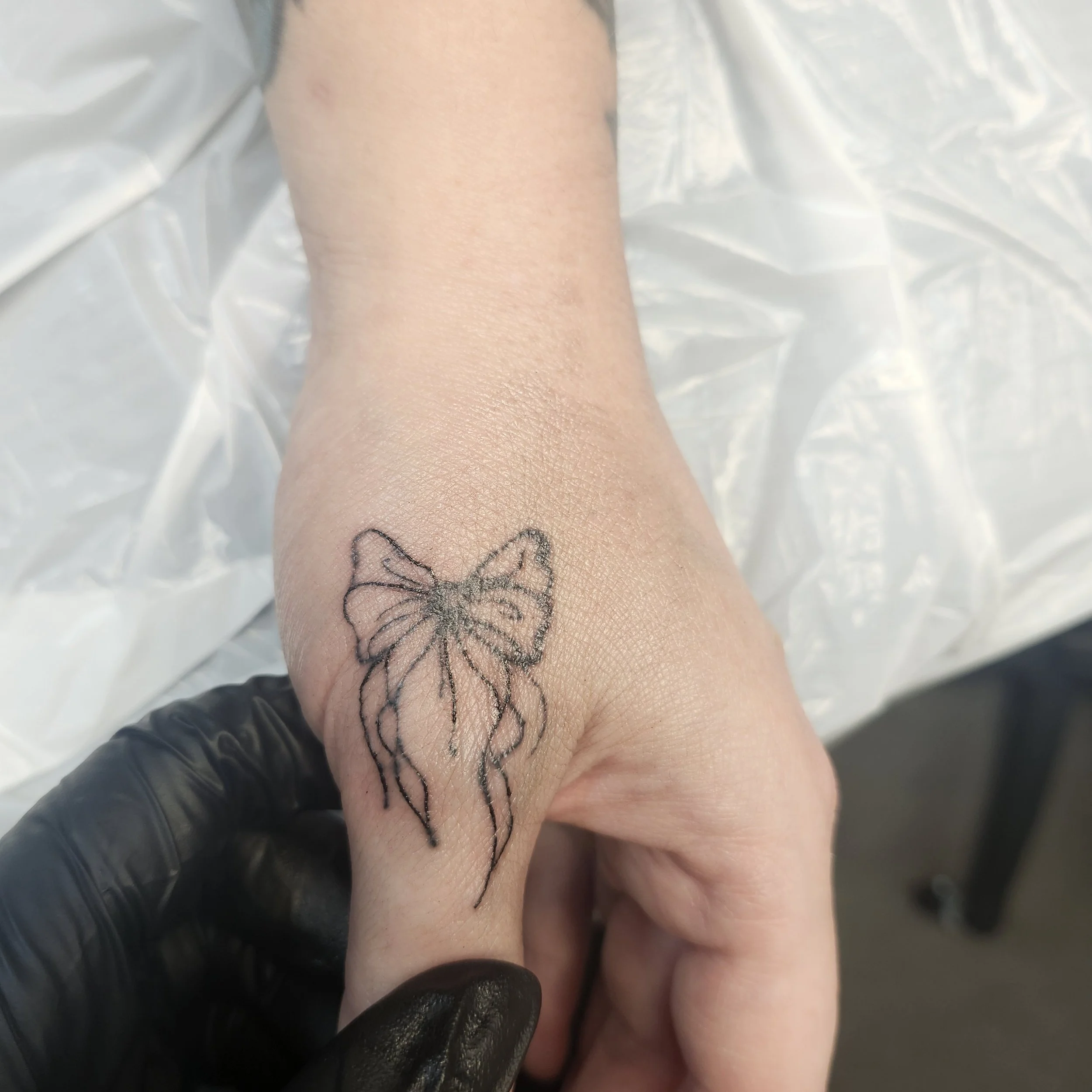 AT Erin Bow tattoo.jpg
