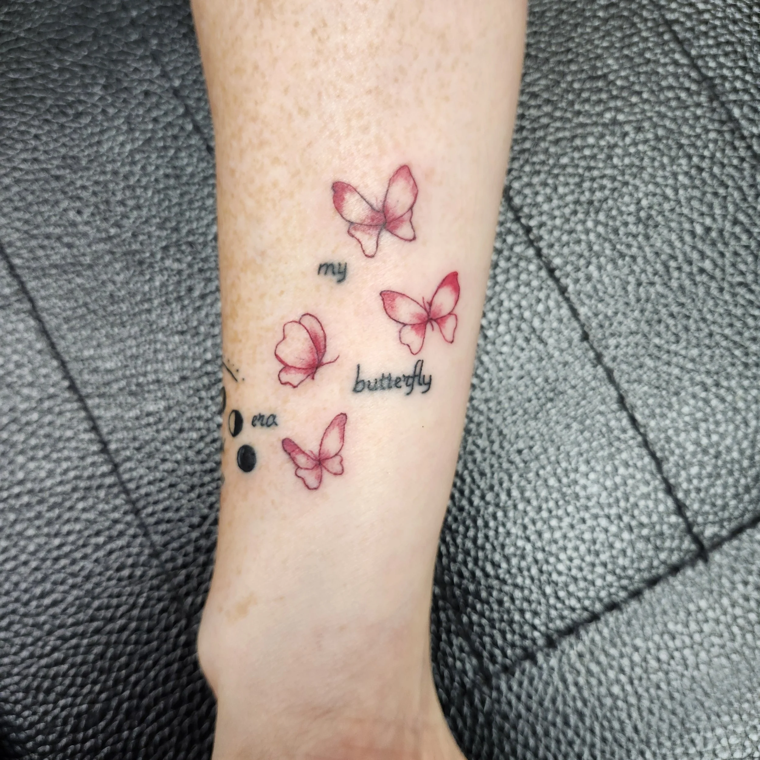 AT red butterflies and script wrist.jpg