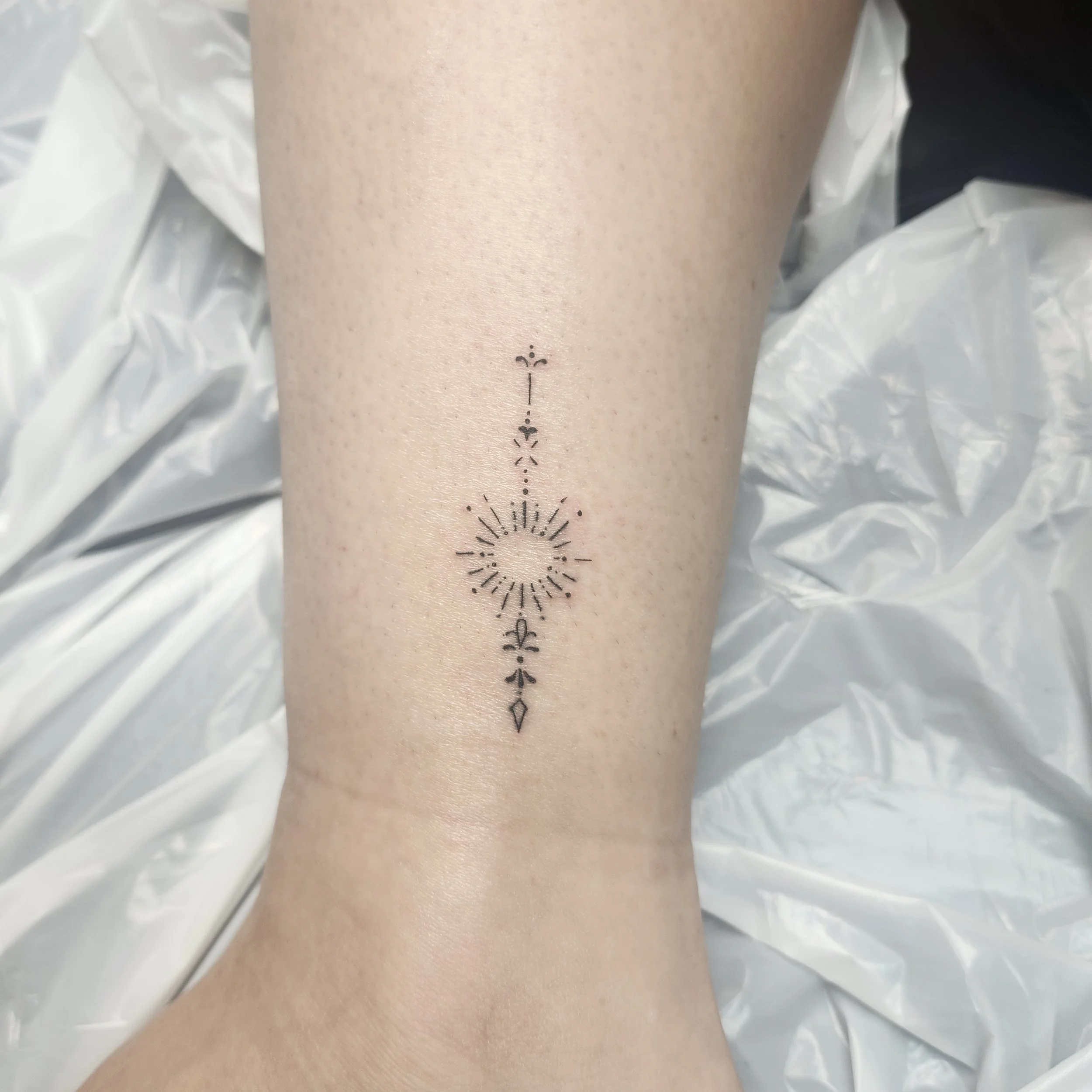 AT Kelly fine line sun.jpg