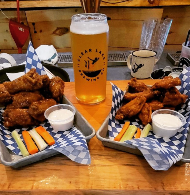 An image of a variety of food and a beer from Clear Lake Brewing Co