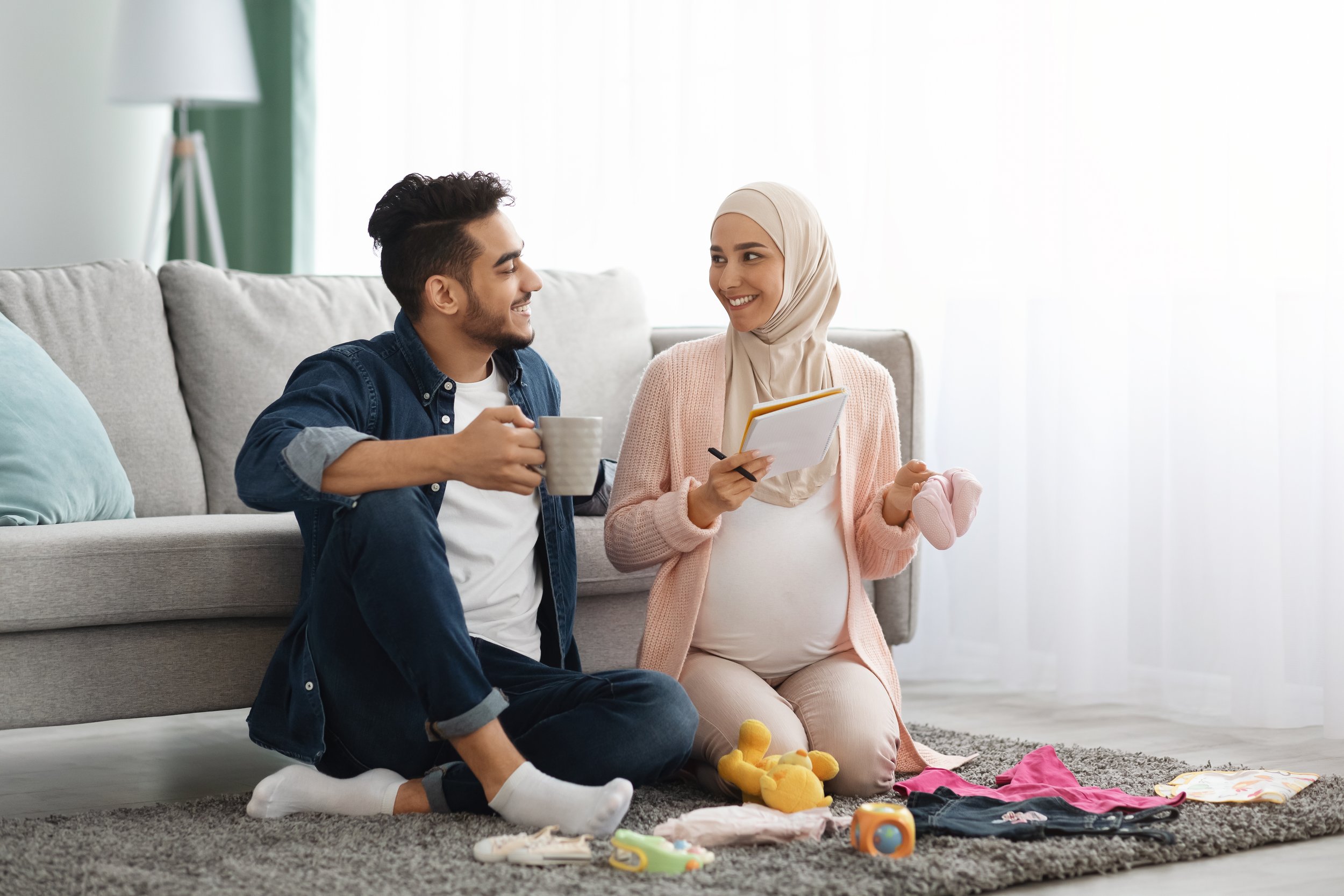 happy-pregnant-muslim-couple-getting-geady-for-chi-2021-09-01-16-40-41-utc.jpg