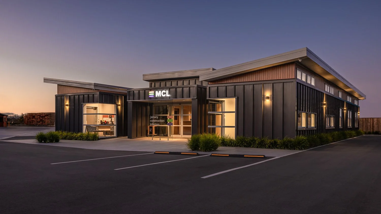 MCL Office exterior at twilight
