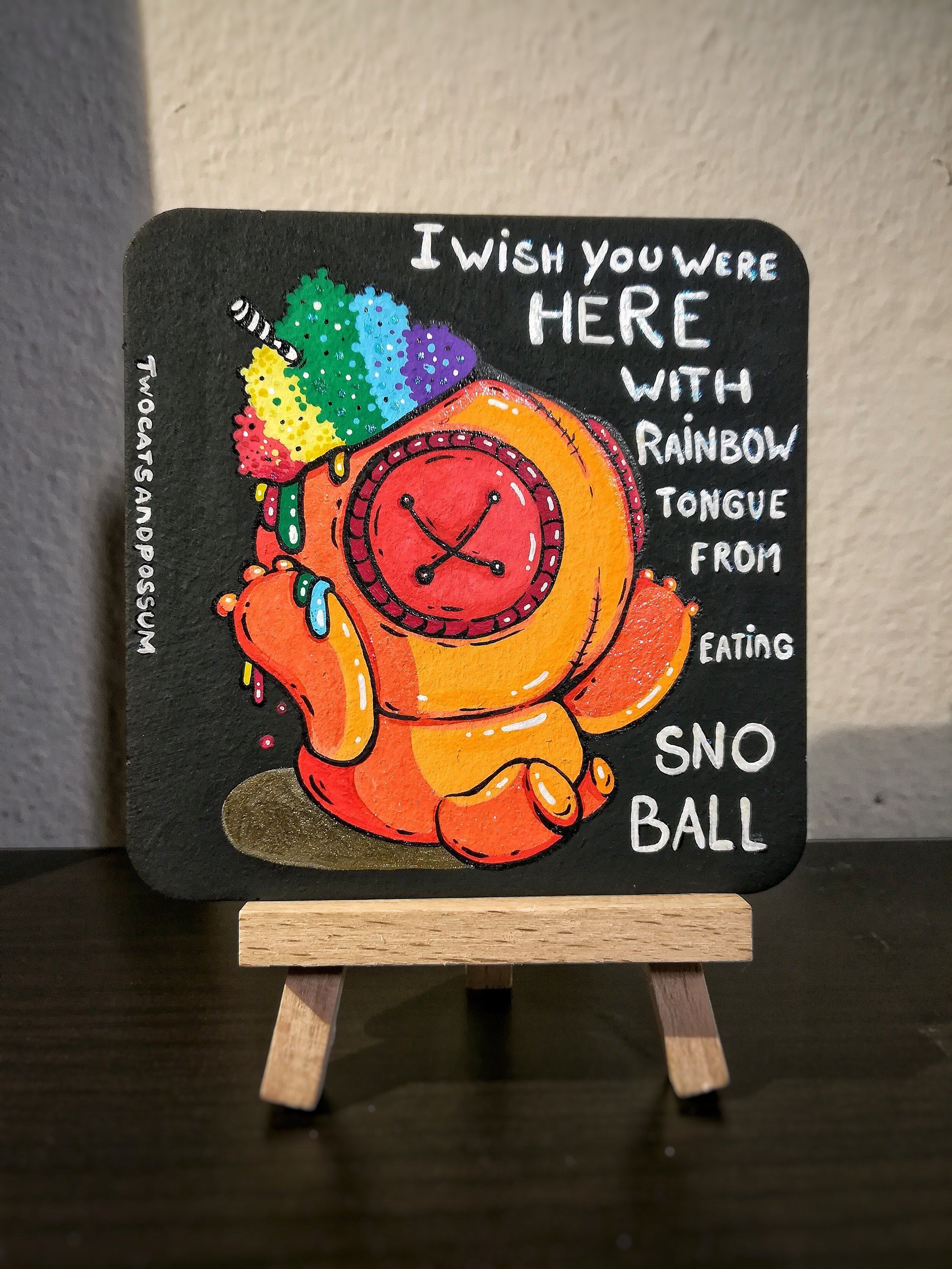 Eddie the voodoo doll with rainbow snowball head