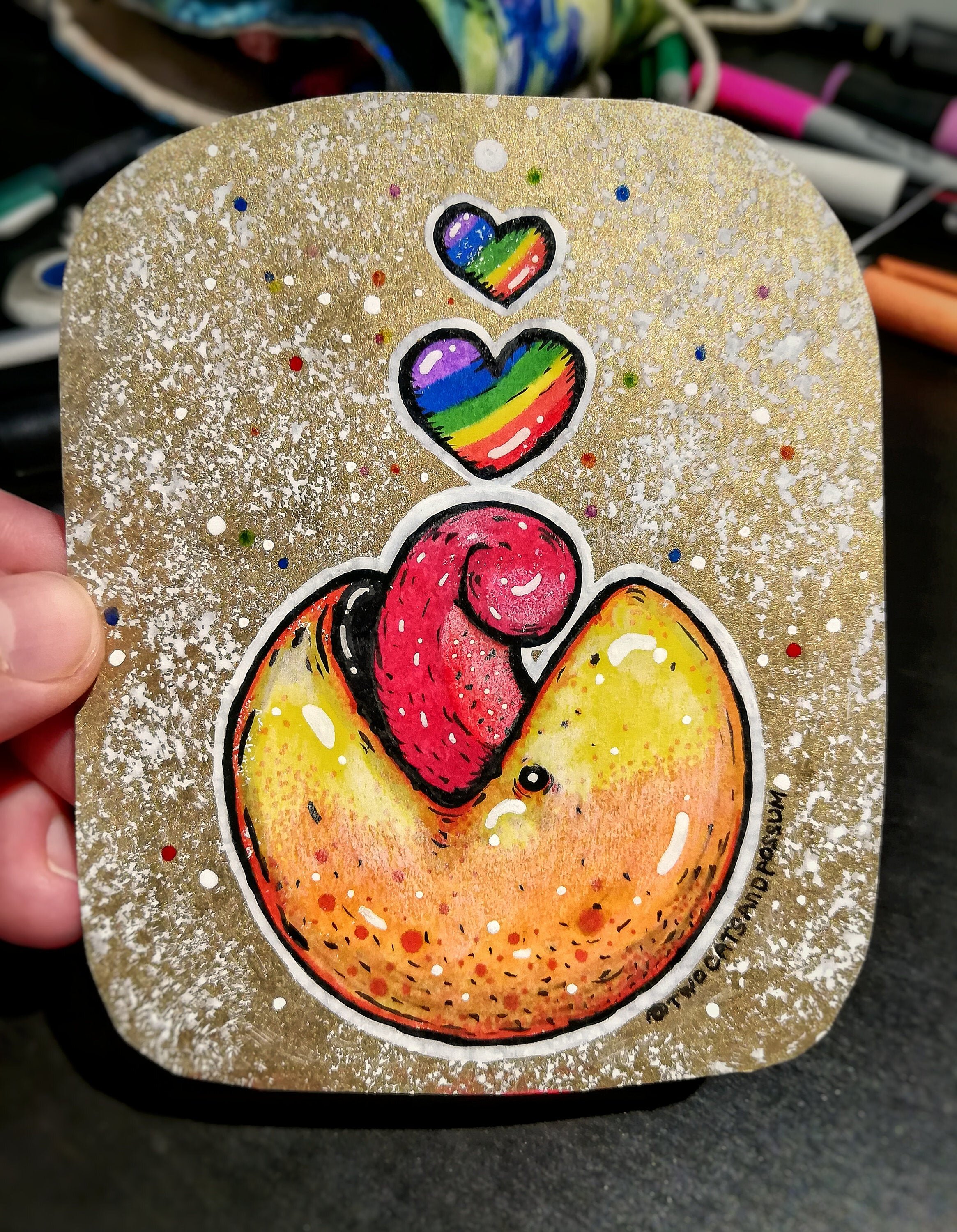 pack man with rainbow hearts sticker