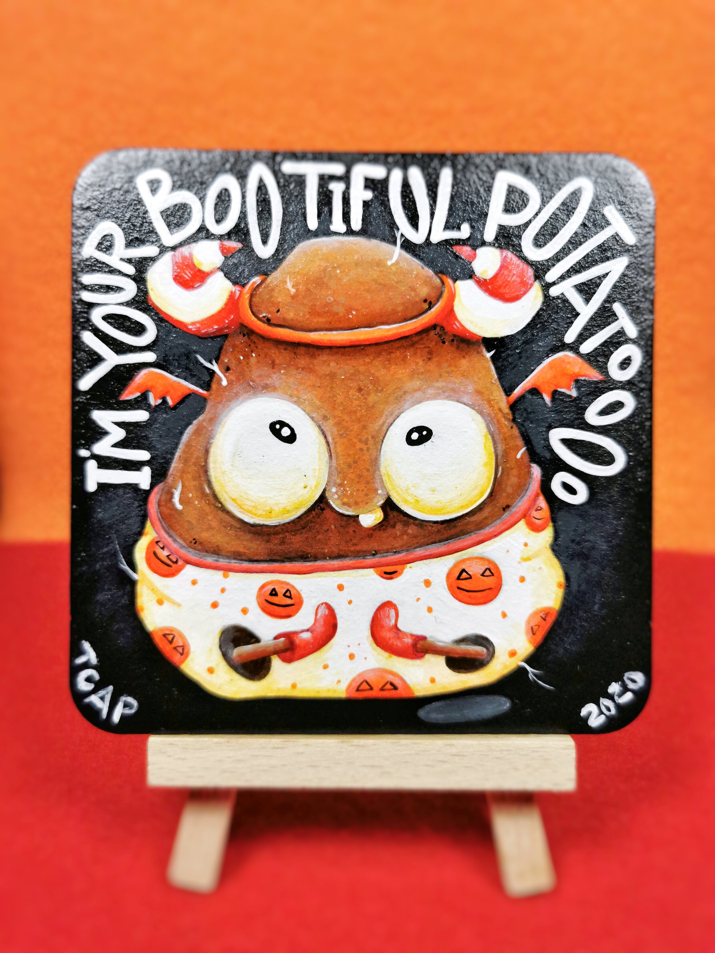 cute couch potato in Halloween costume art on beer coaster