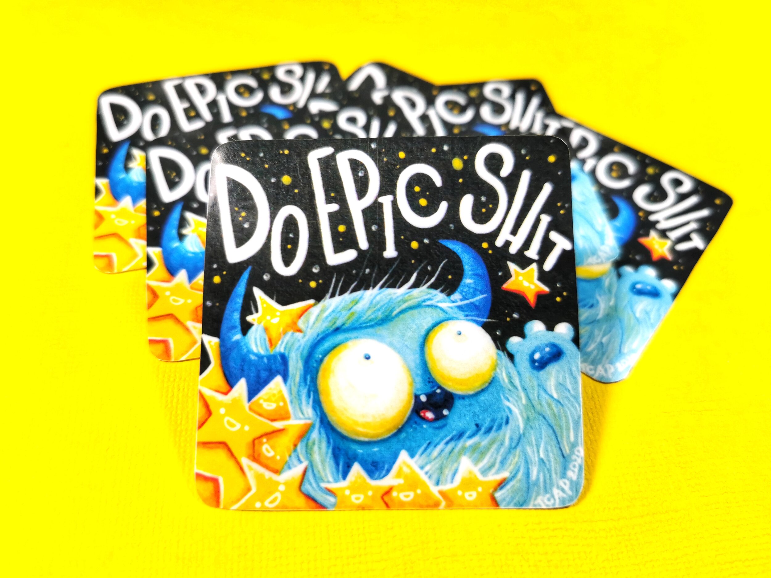 do-epic-shit-stickers-laying-on-yellow-background.jpeg
