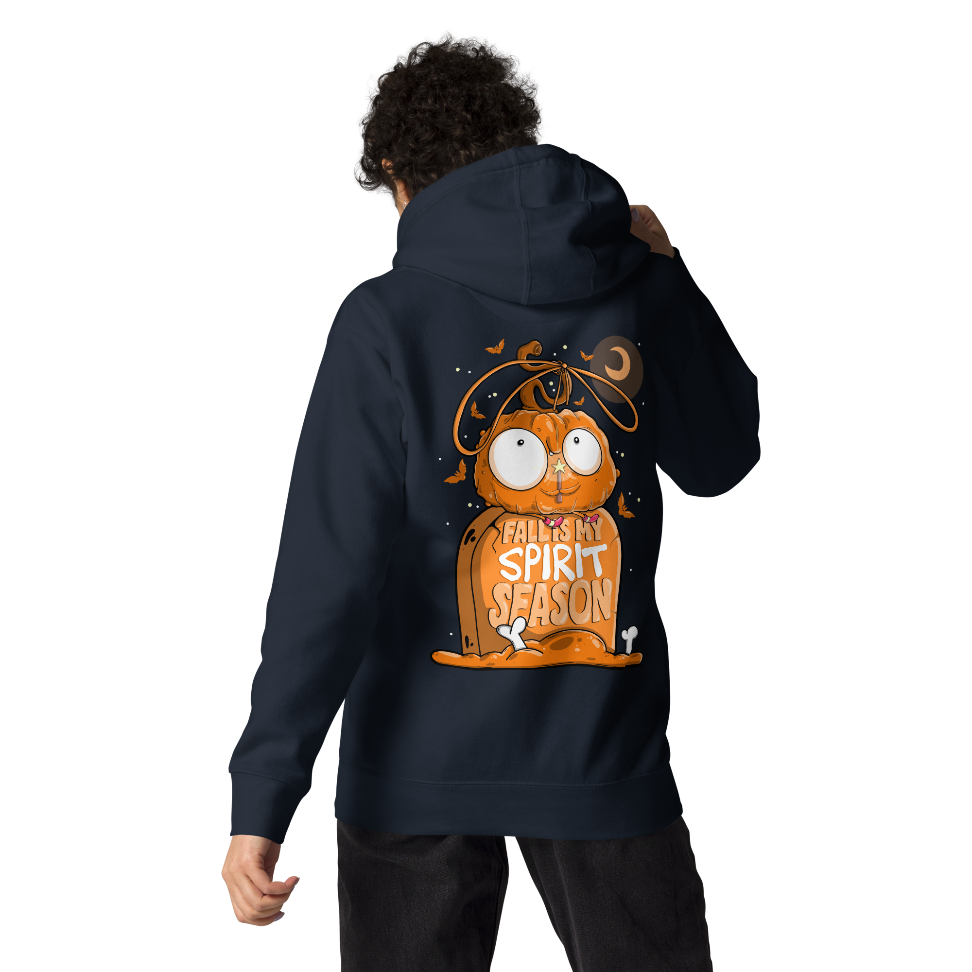 a young man wearing navy Halloween hoodie featuring a cute cartoon pumpkin sitting atop a gravestone with the words "Fall is my spirit season"