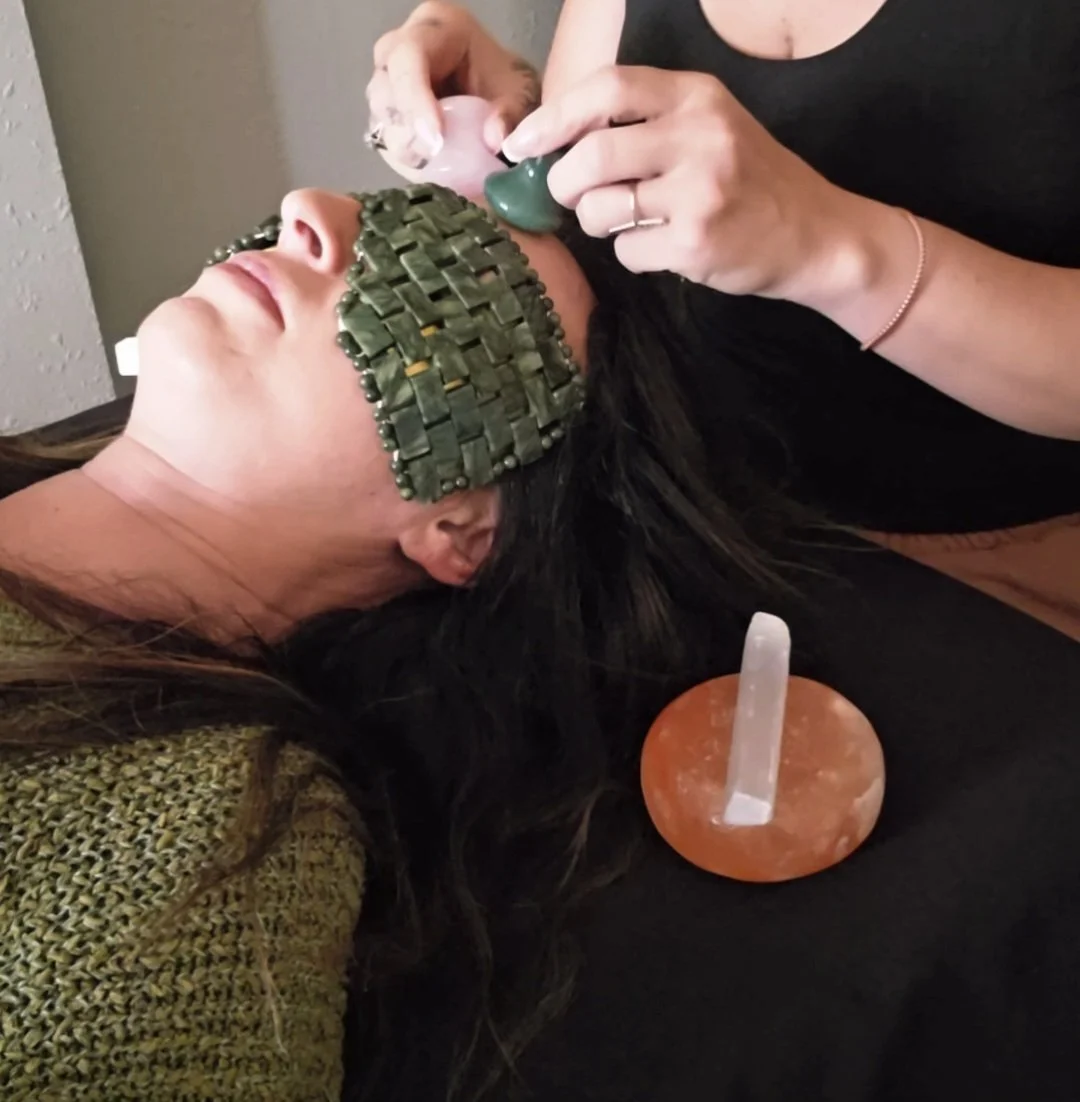 Client receiving a luxury head-to-toe pampering session with scalp care, jade eye mask, foot reflexology and Reiki-infused relaxation in Westminster, Colorado