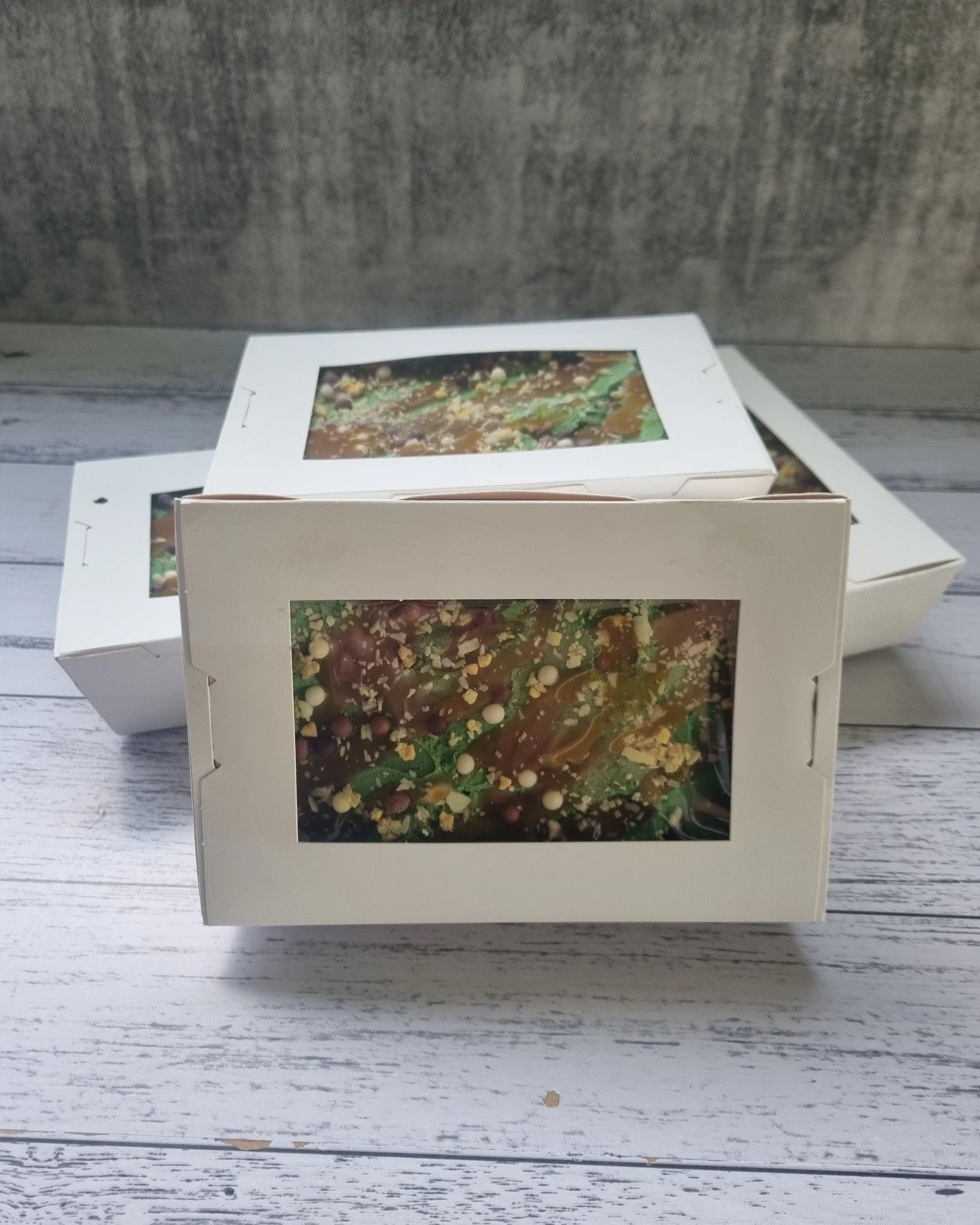 Ugly cake is back ! Limited supply.

These are a mixture of banana cake and chocolate cake with green vanilla icing and caramel sauce topped with chocolate bubbles. 

$10 pick up woodville 

Please message to organize pickup as im im and out all day.