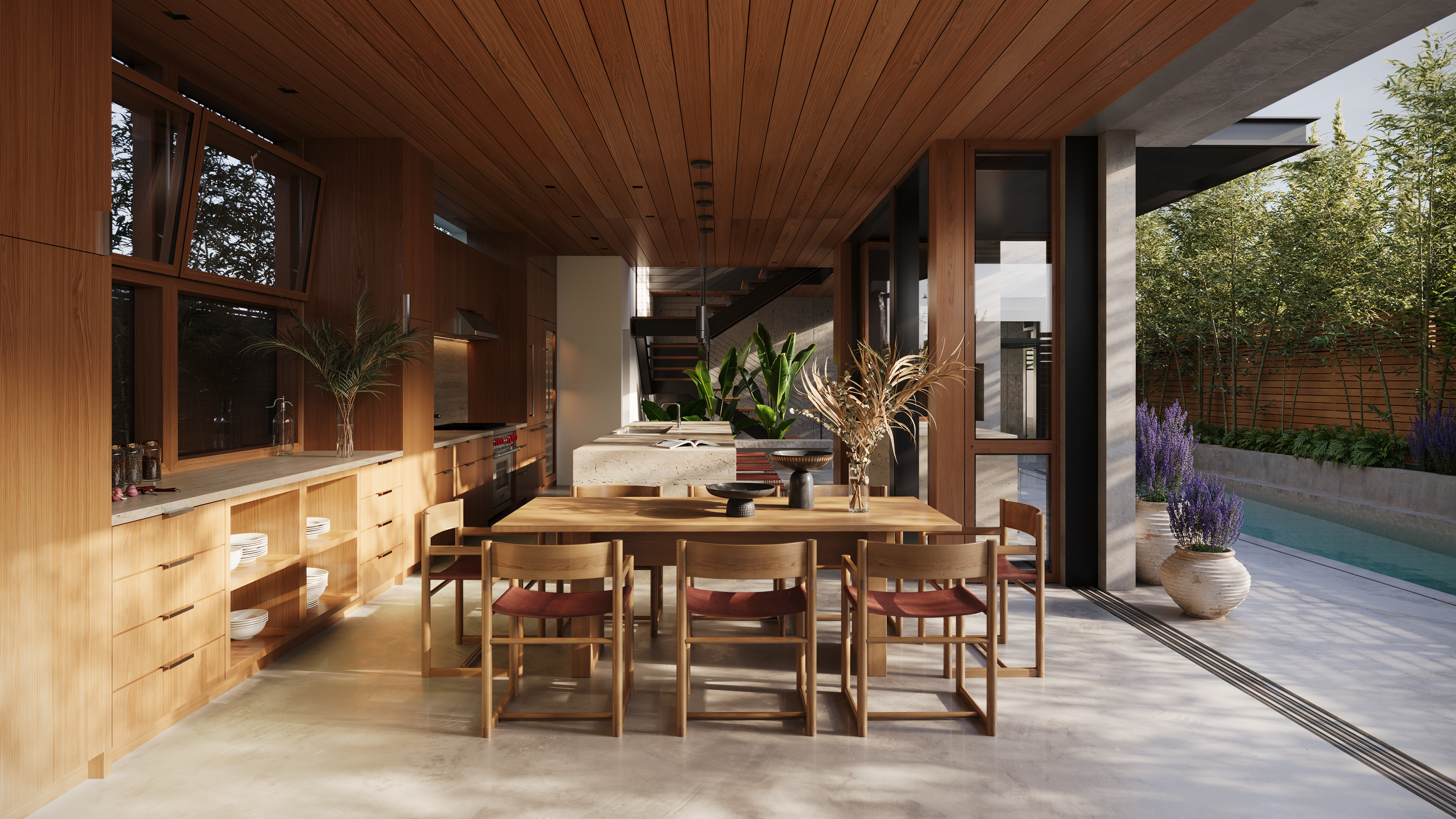 Modern kitchen and dining area with wooden cabinetry, a table with chairs, potted plants, and large glass doors opening to an outdoor pool and garden with trees and lavender flowers.