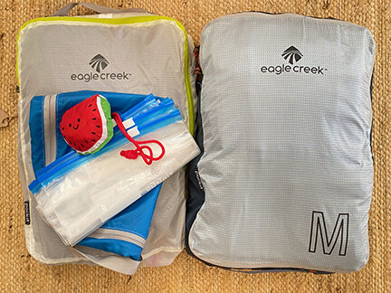 Packing cubes, laundry bag, Ziplocs, shopping bag