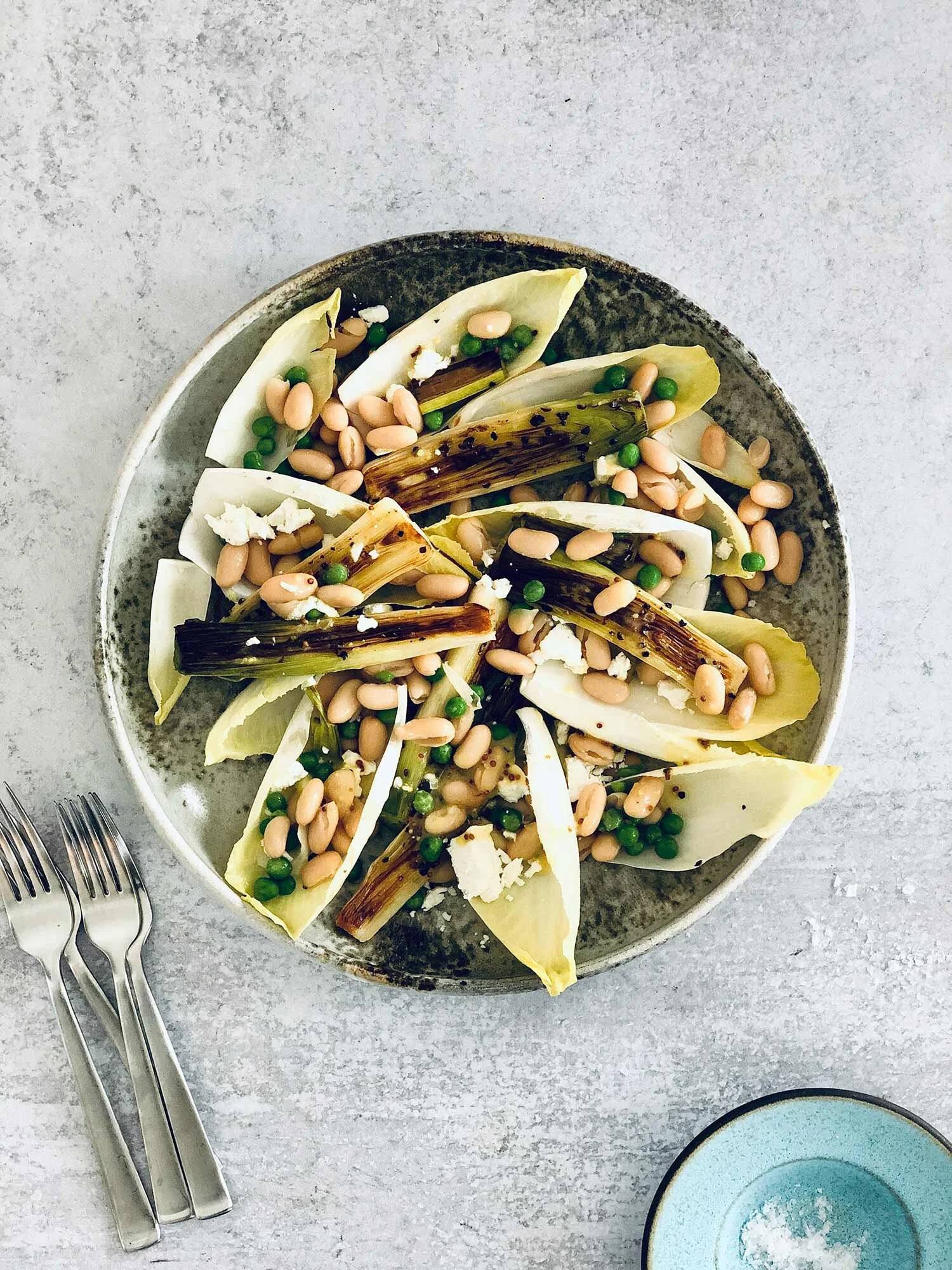 Charred Leeks Vinaigrette with Endive, Peas and Cannellini Beans