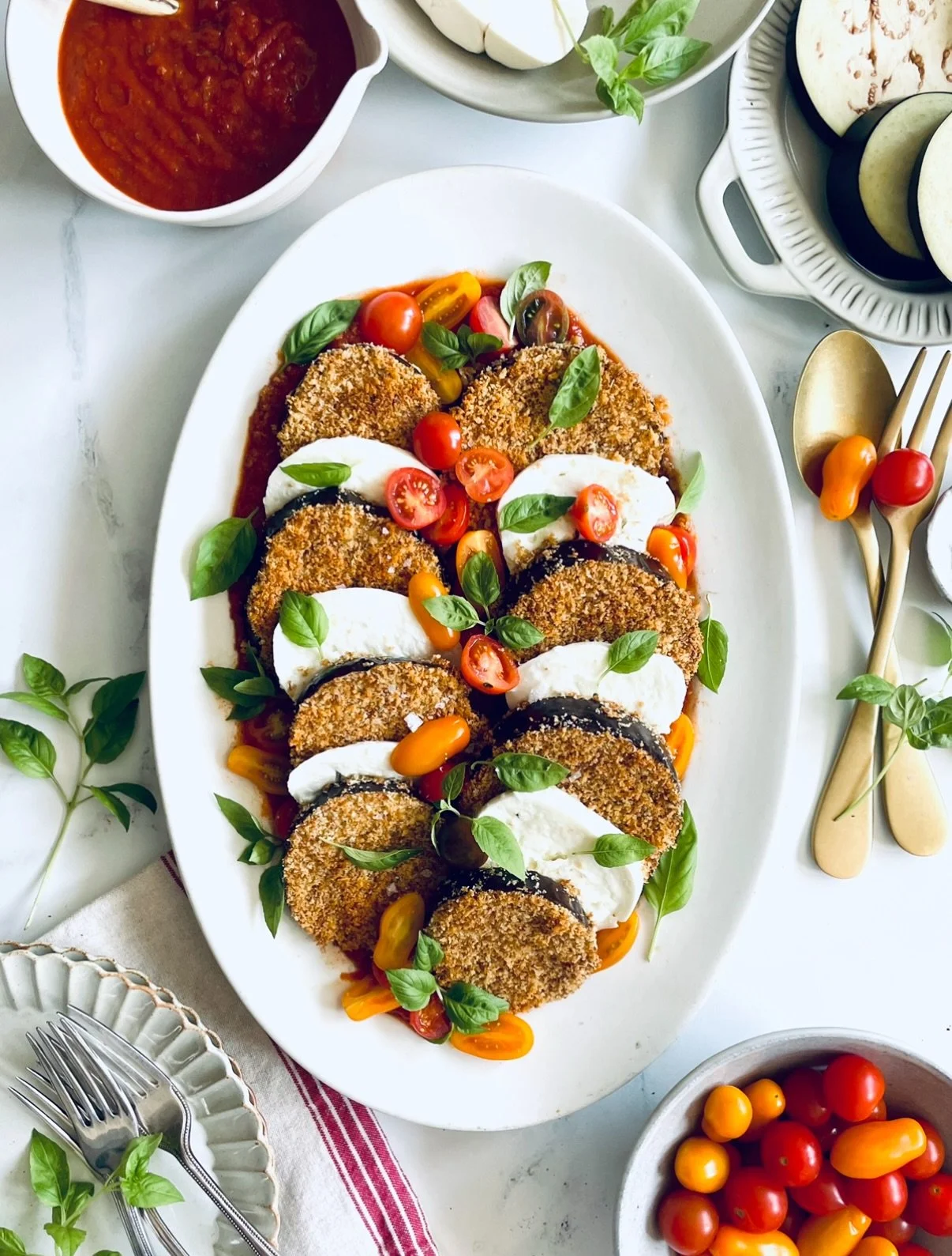 Comment RECIPE for my Crispy Eggplant Caprese✨

Rounds of warm, panko-coated crunchy, tender, oven-baked eggplant, the freshness of sweet cherry tomatoes and creamy cheesy mozzarella, all atop a bed of warm marinara. It&rsquo;s got the lightness of a