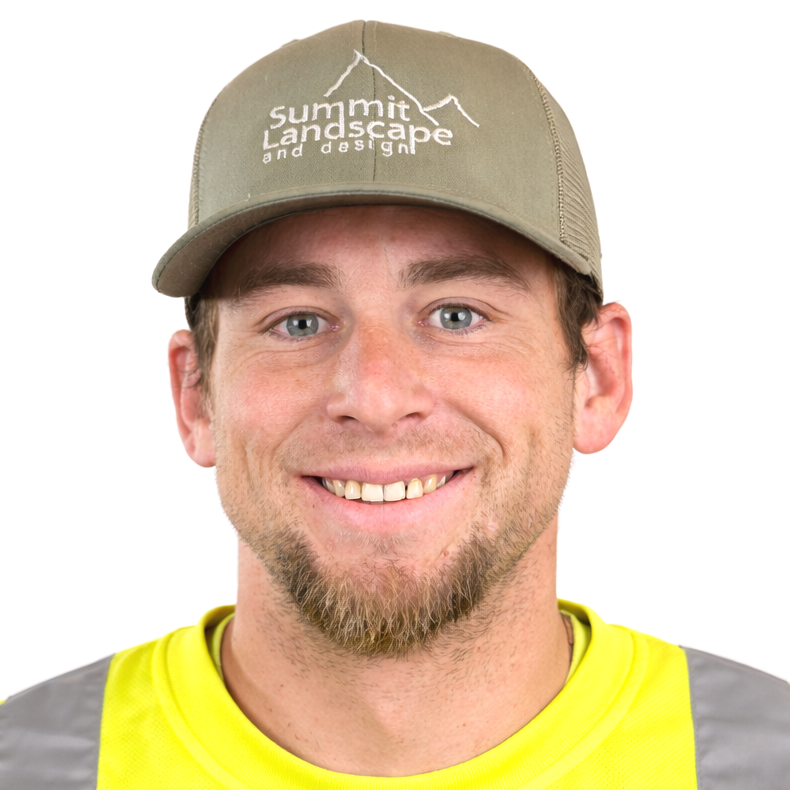 A smiling man wearing a khaki cap with 'Summit Landscape and Design' embroidered on it and a yellow safety vest.