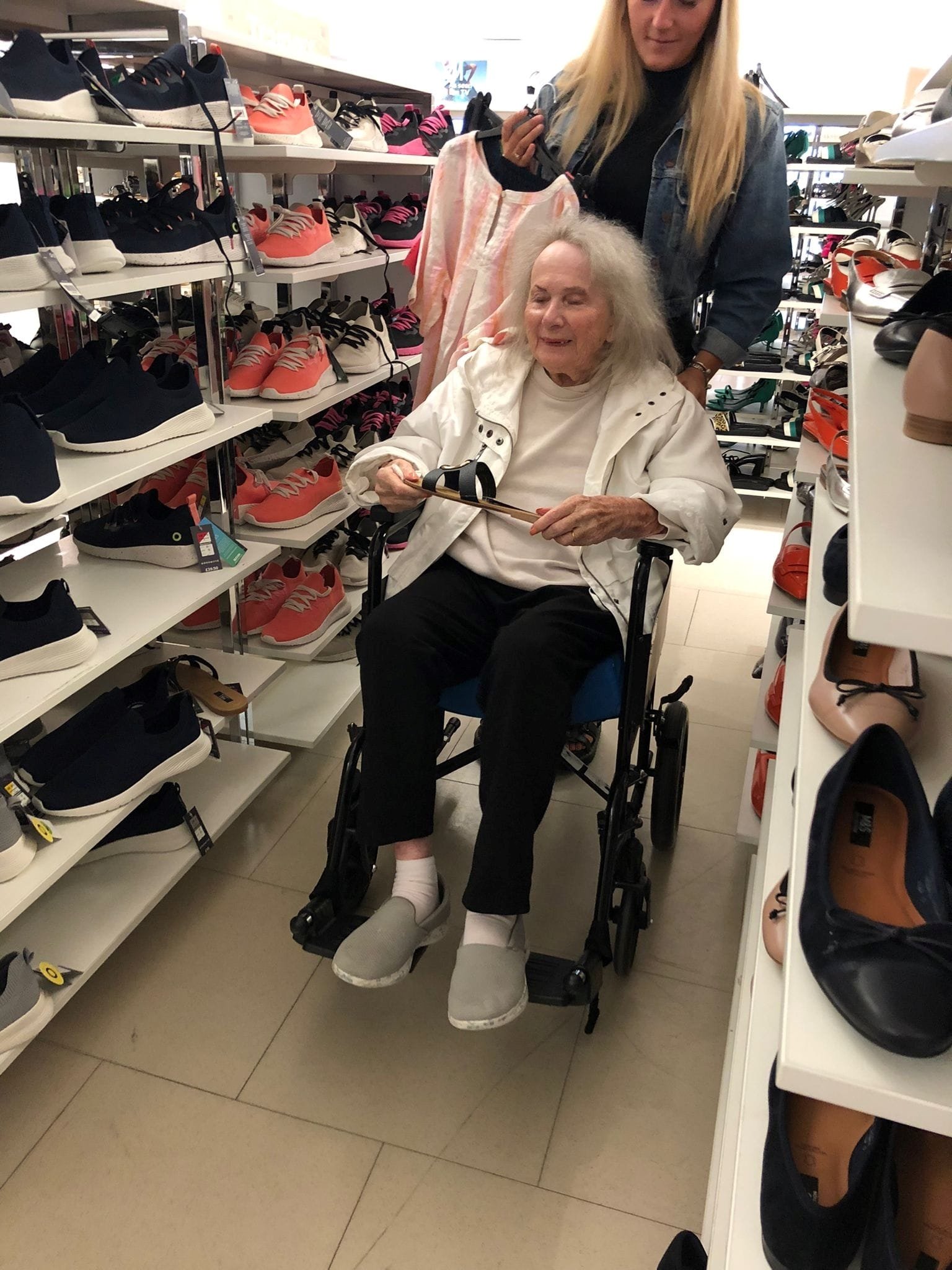 Audrey Cox browsing the shoes in M&S.jpg