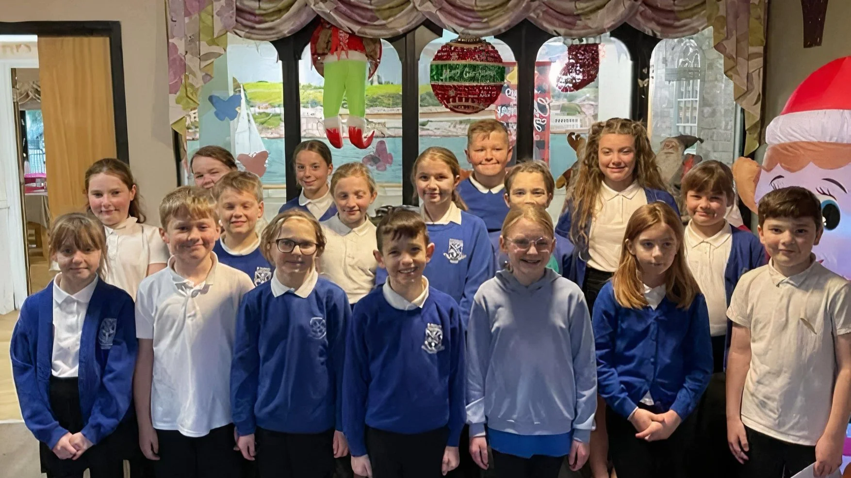Little angels bring Christmas joy to elderly neighbours