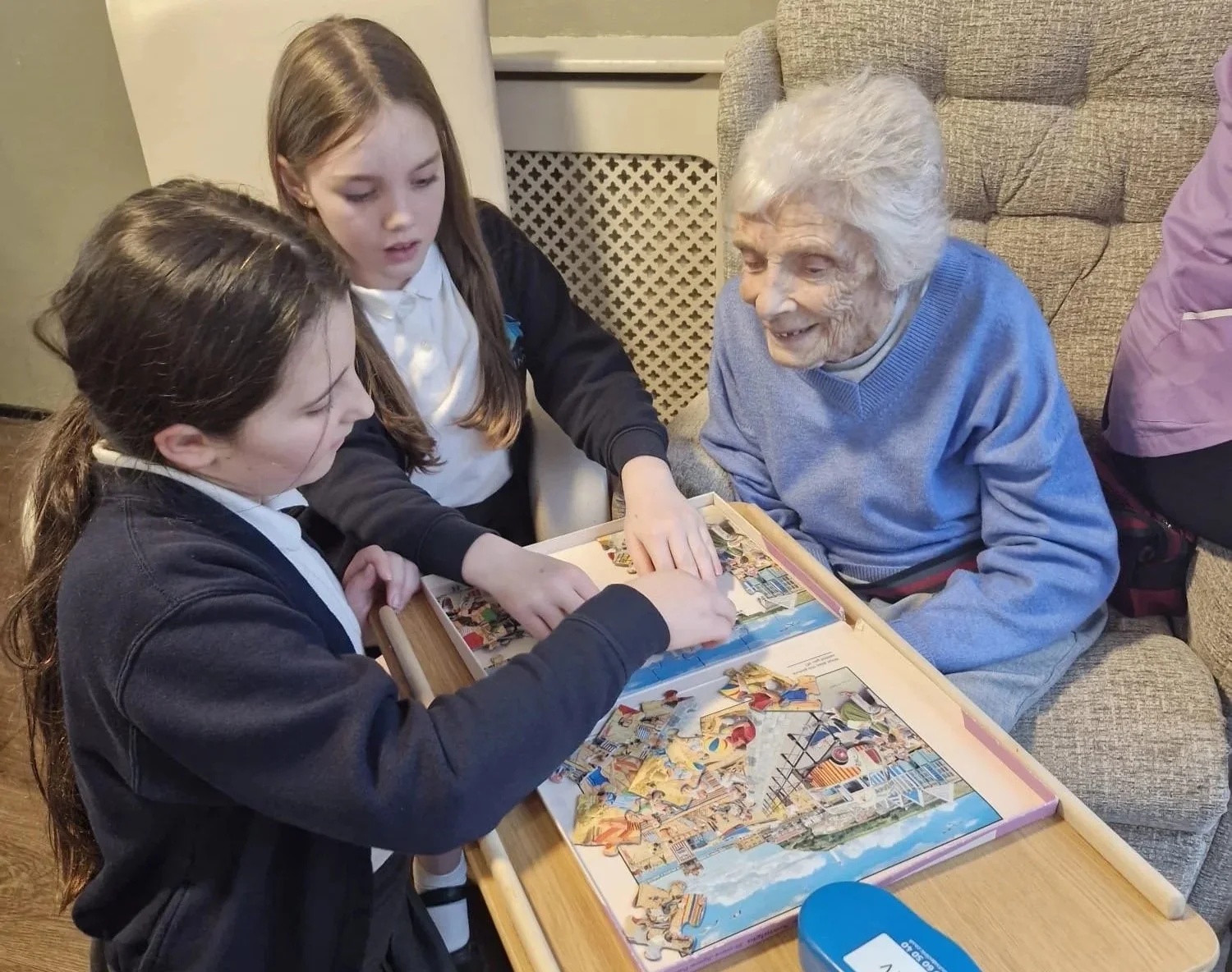 Fun and games as care home residents welcome local pupils
