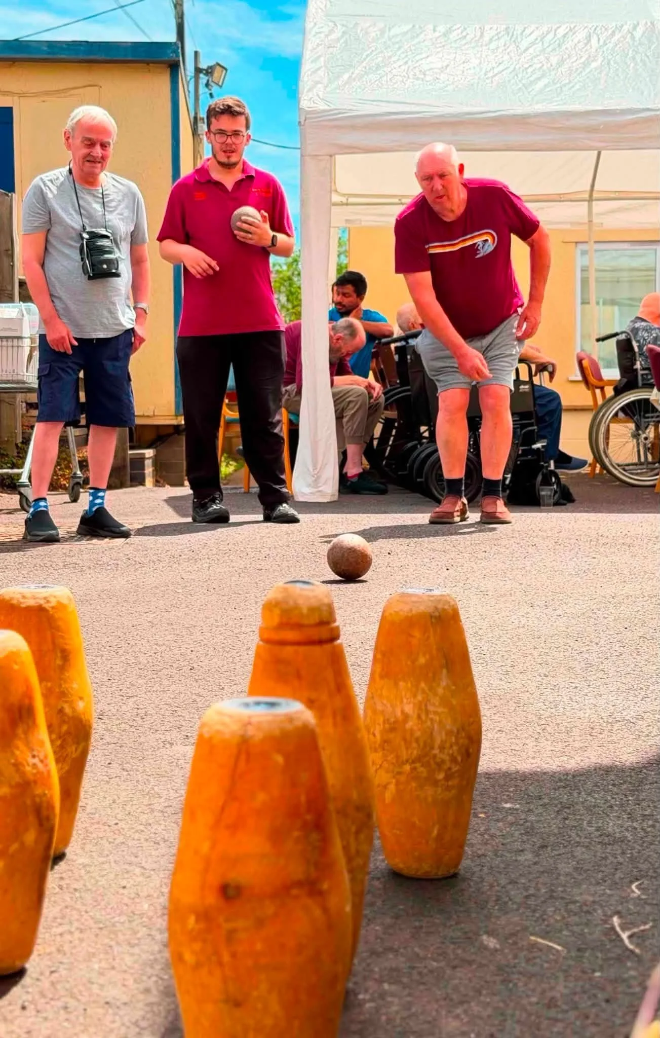 L-R Kenny Channing, Michael Rowe (activities assistant), Roy Newton (bowling).jpg
