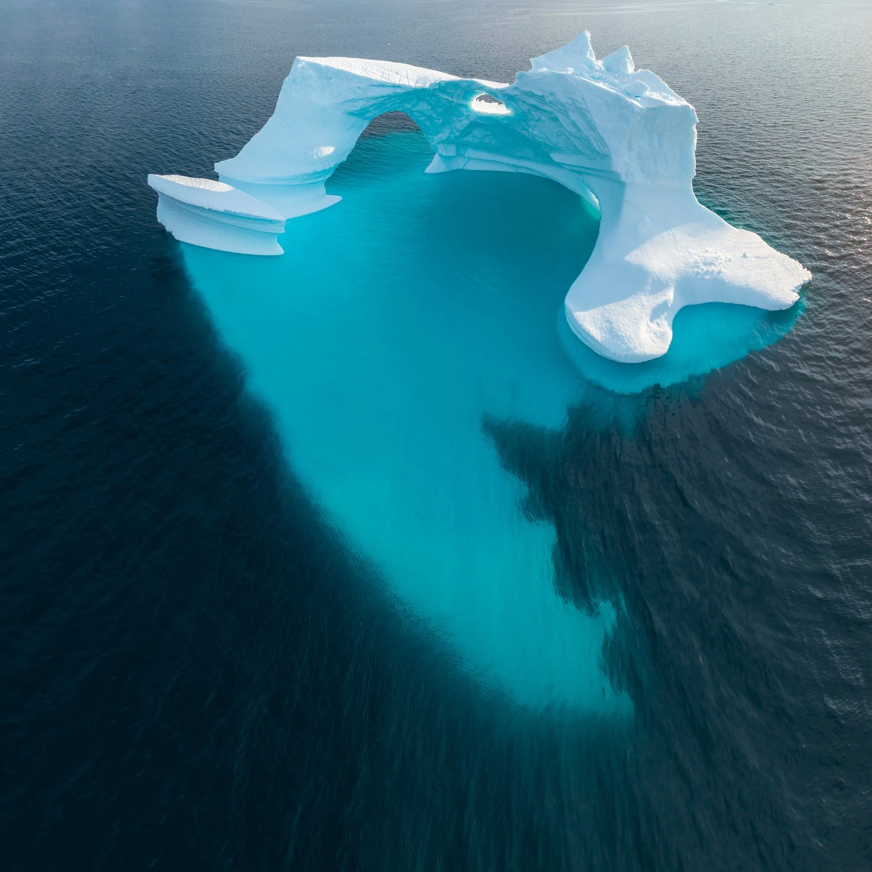 Iceberg with large hidden mass, symbolising unseen issues in a leadership team