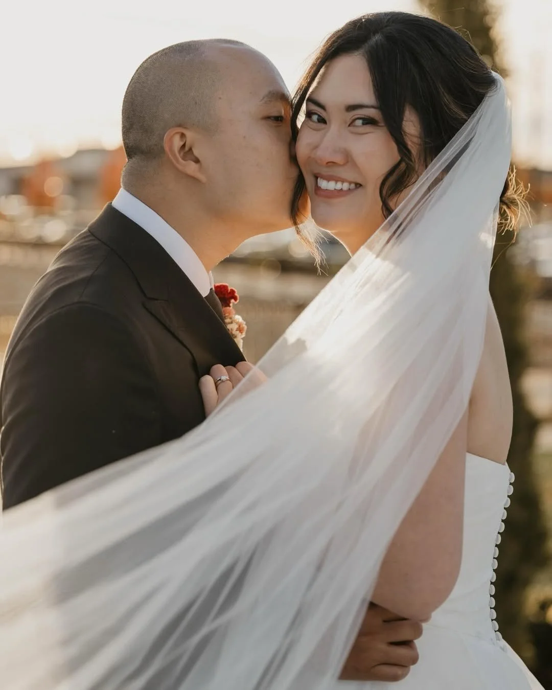 Bride with elegant bridal hair and makeup by TEAL Hair & Makeup Studio