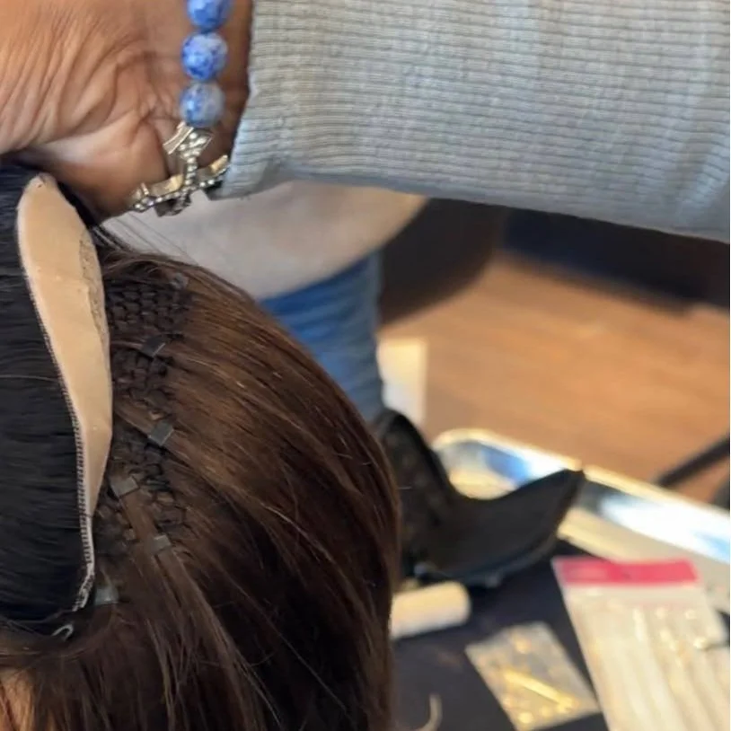 Mesh Integration hair extensions with a lightweight mesh base and brown hair integrated across the crown.