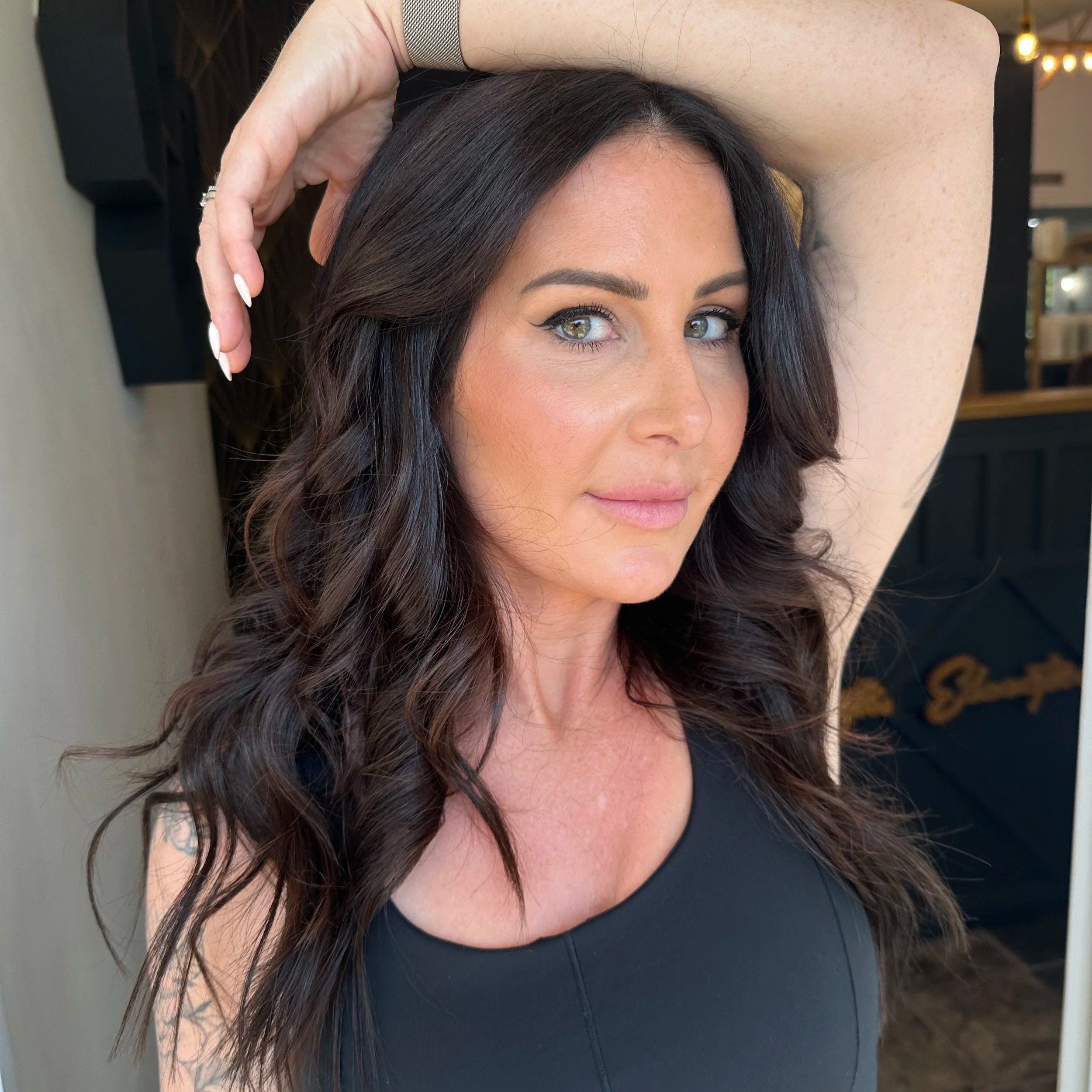 Dimensional brunette hair with seamless extensions by Christina at TEAL Hair & Makeup Studio