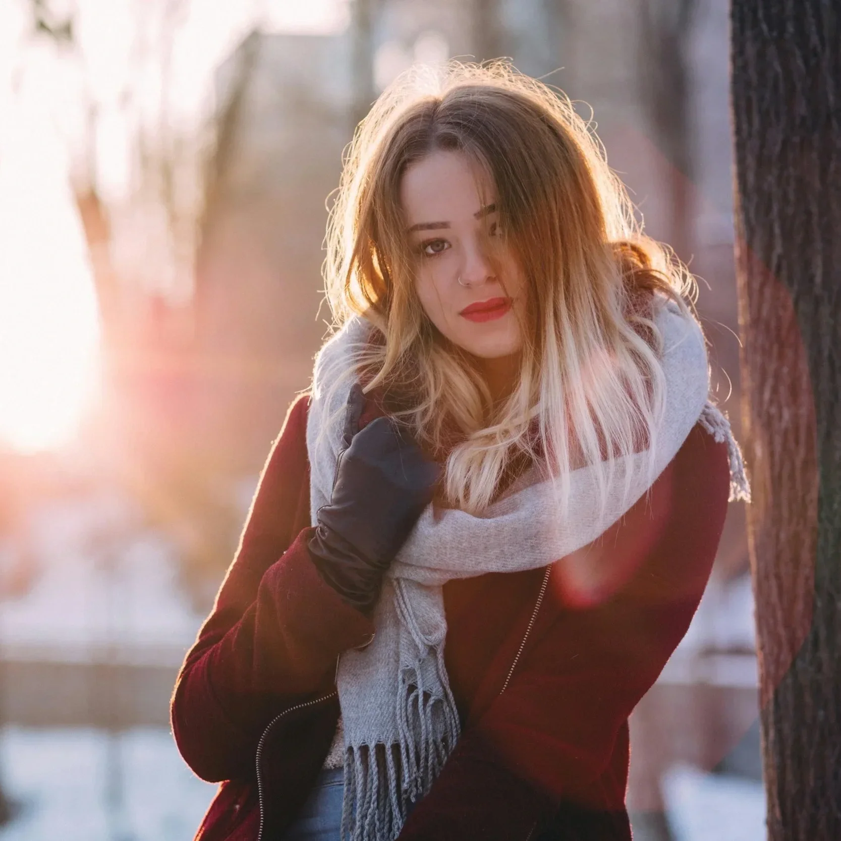 Woman with shoulder-length ombré hair outdoors in winter weather