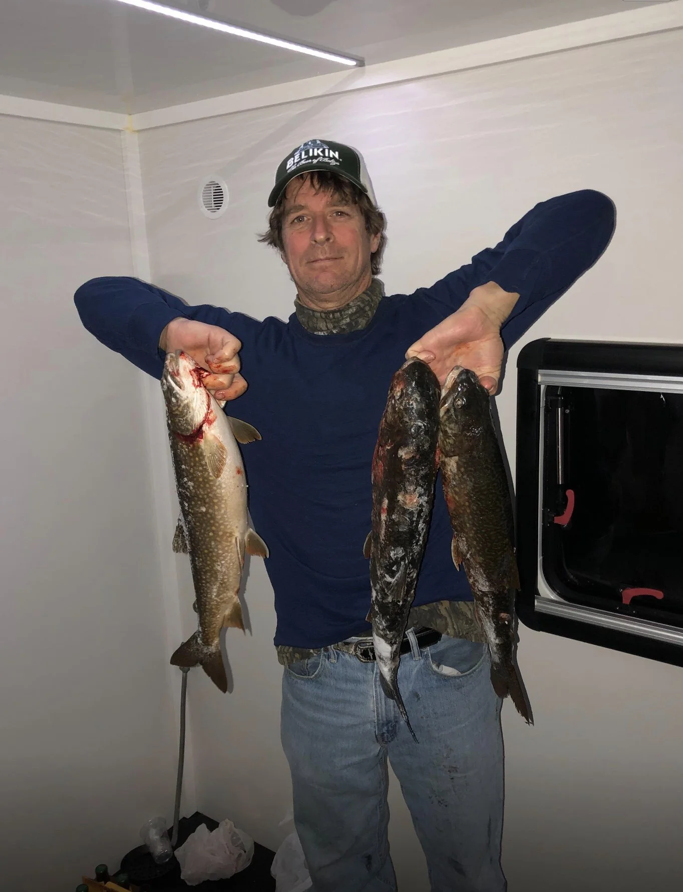 ice house rental Ely MN lake trout catch