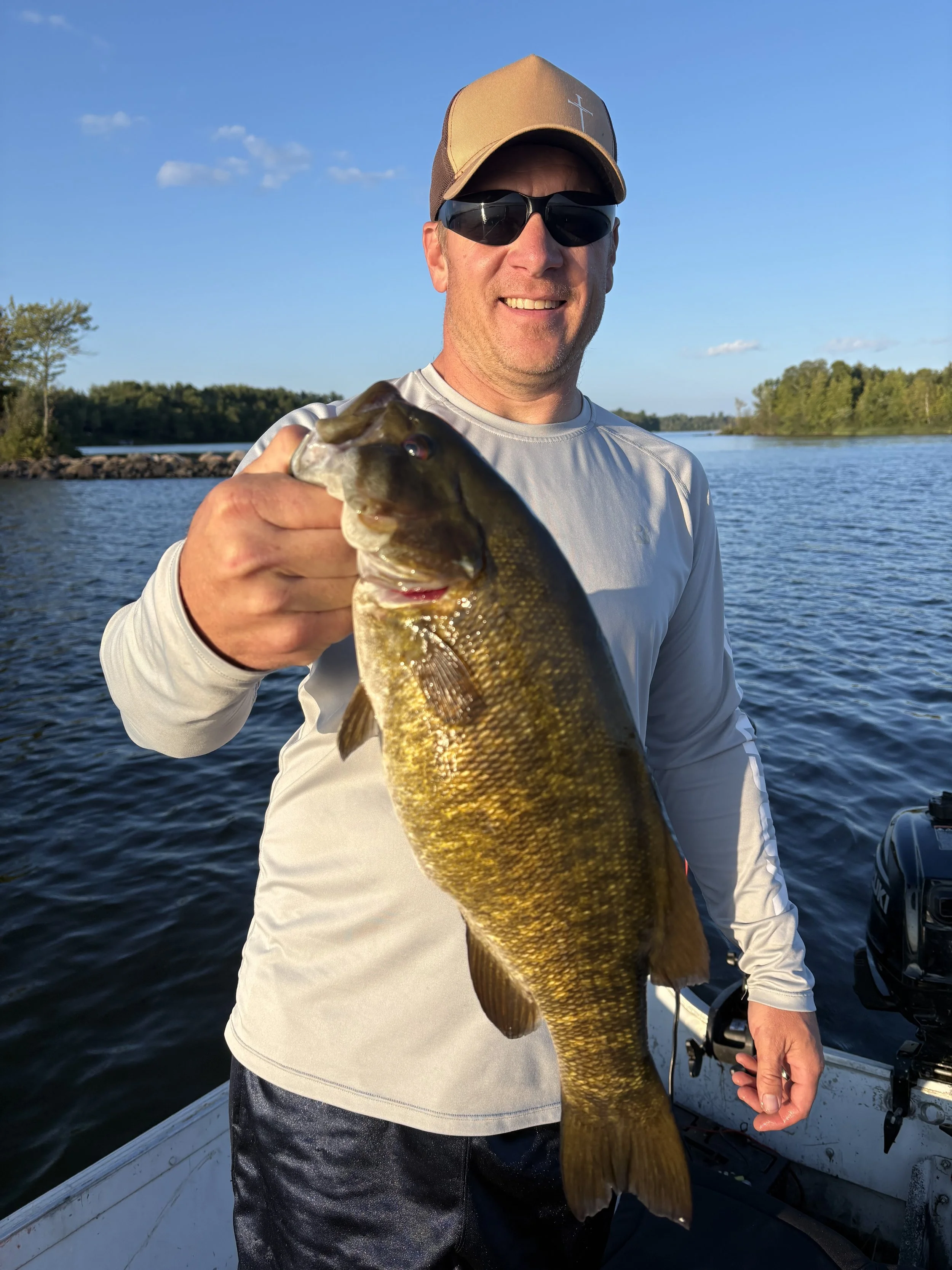 Nice smallmouth bass caught on Ely area lake near BWCA. Early fall fishing from Arrowhead Outdoors.