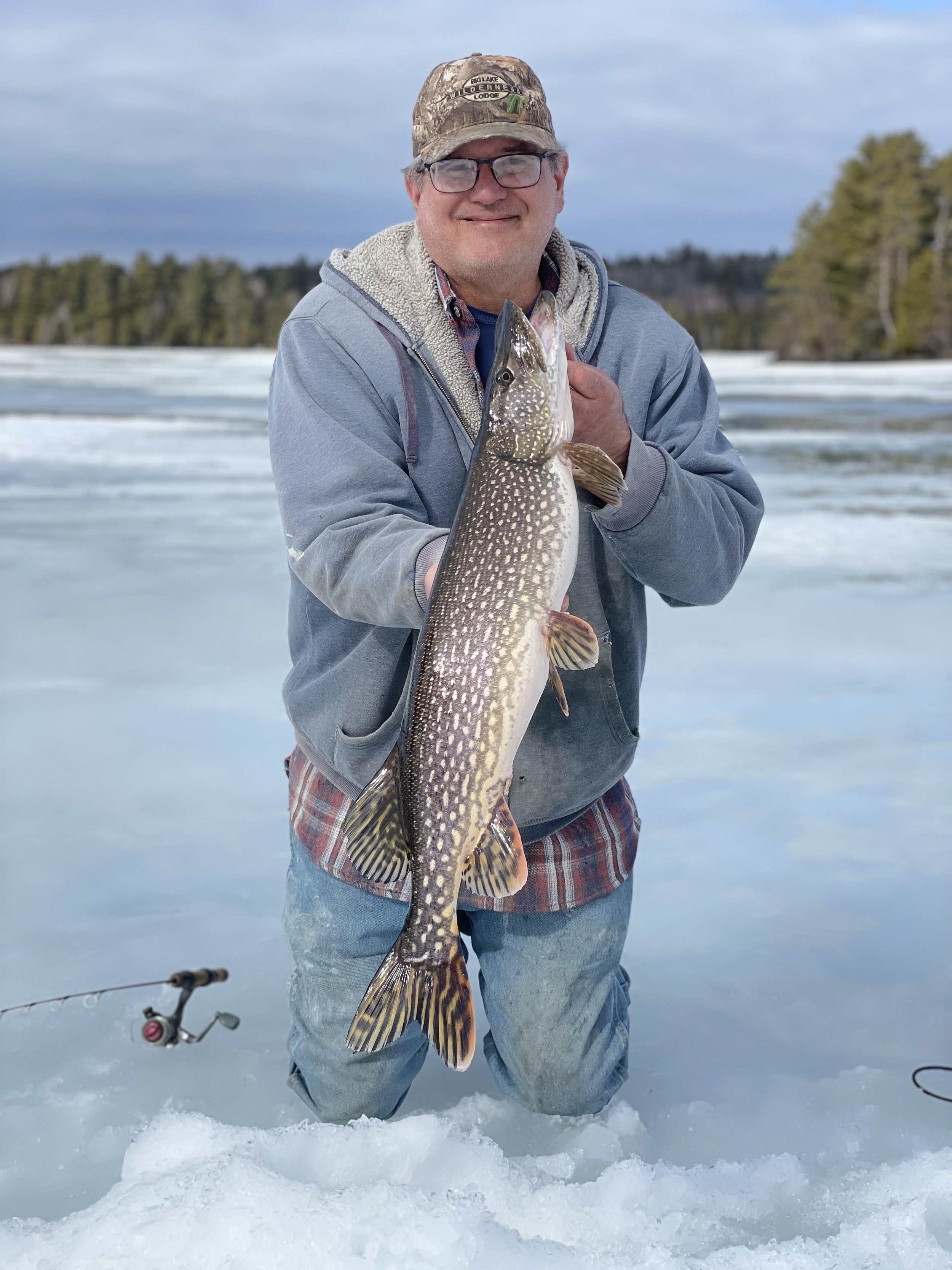 Ely local Jack Cudd with northern pike caught on late ice while fishing for tullibees near BWCA. Arrowhead Outdoors report.