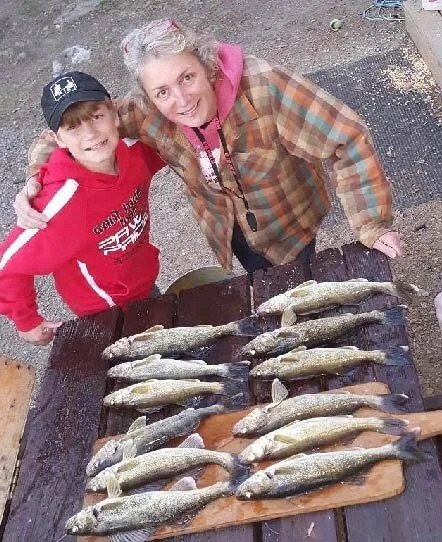 Kids walleye catch Ely MN family table - Young anglers walleye haul Arrowhead Outdoors report