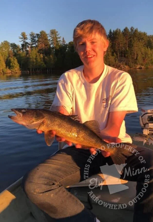 BWCA walleye catch August 25 2020 Ely MN - Young boy kid angler hold Boundary Waters Arrowhead Outdoors report