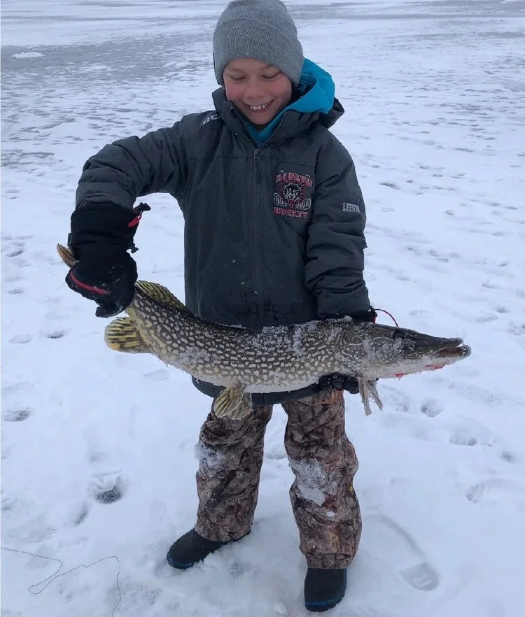 Ely MN BWCA kid northern pike ice fishing catch Arrowhead Outdoors report January 2021