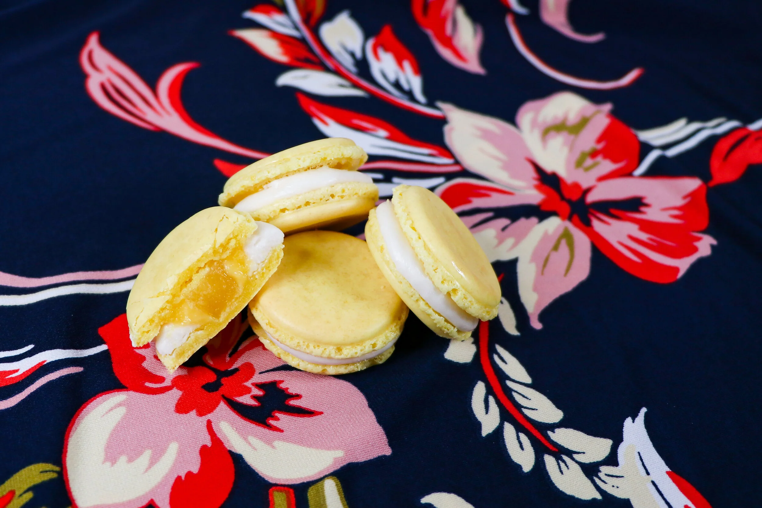Pina Colada Macaron - Coconut buttercream, pineapple curd filling