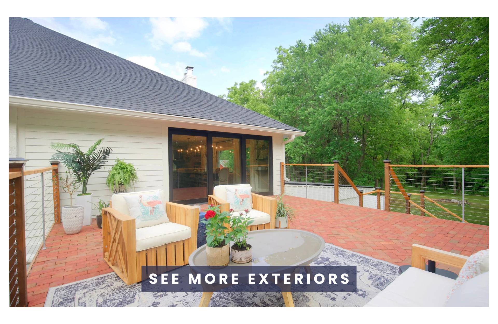 Beautiful deck with chairs and plants.