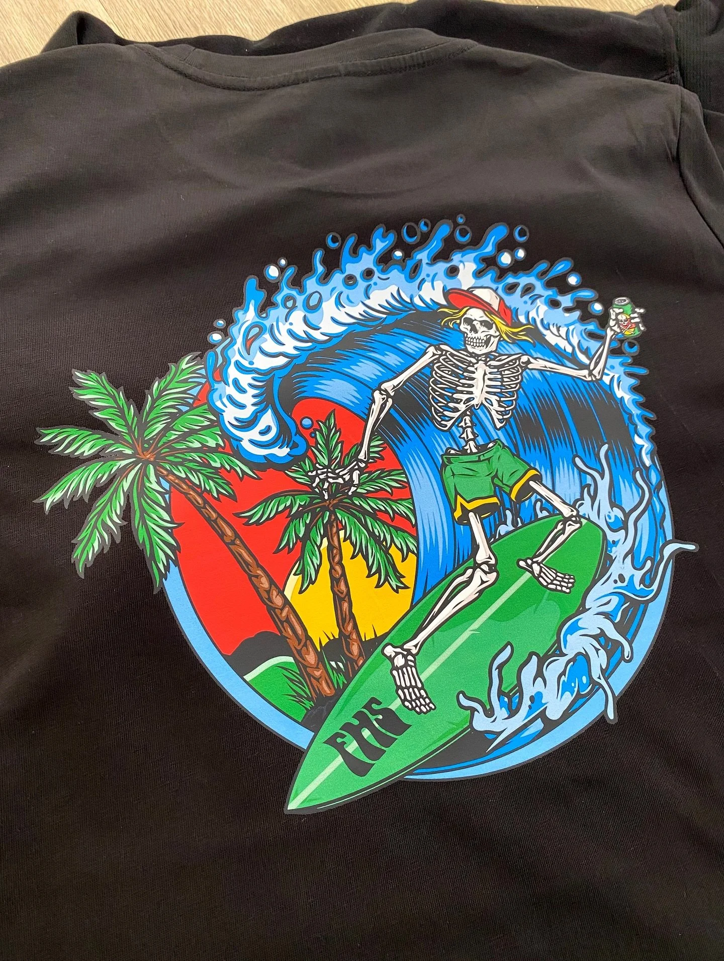 Custom apparel printed for FHS Surf in Victoria, featuring quality @ascolour blanks including tees, hoodies, and caps.