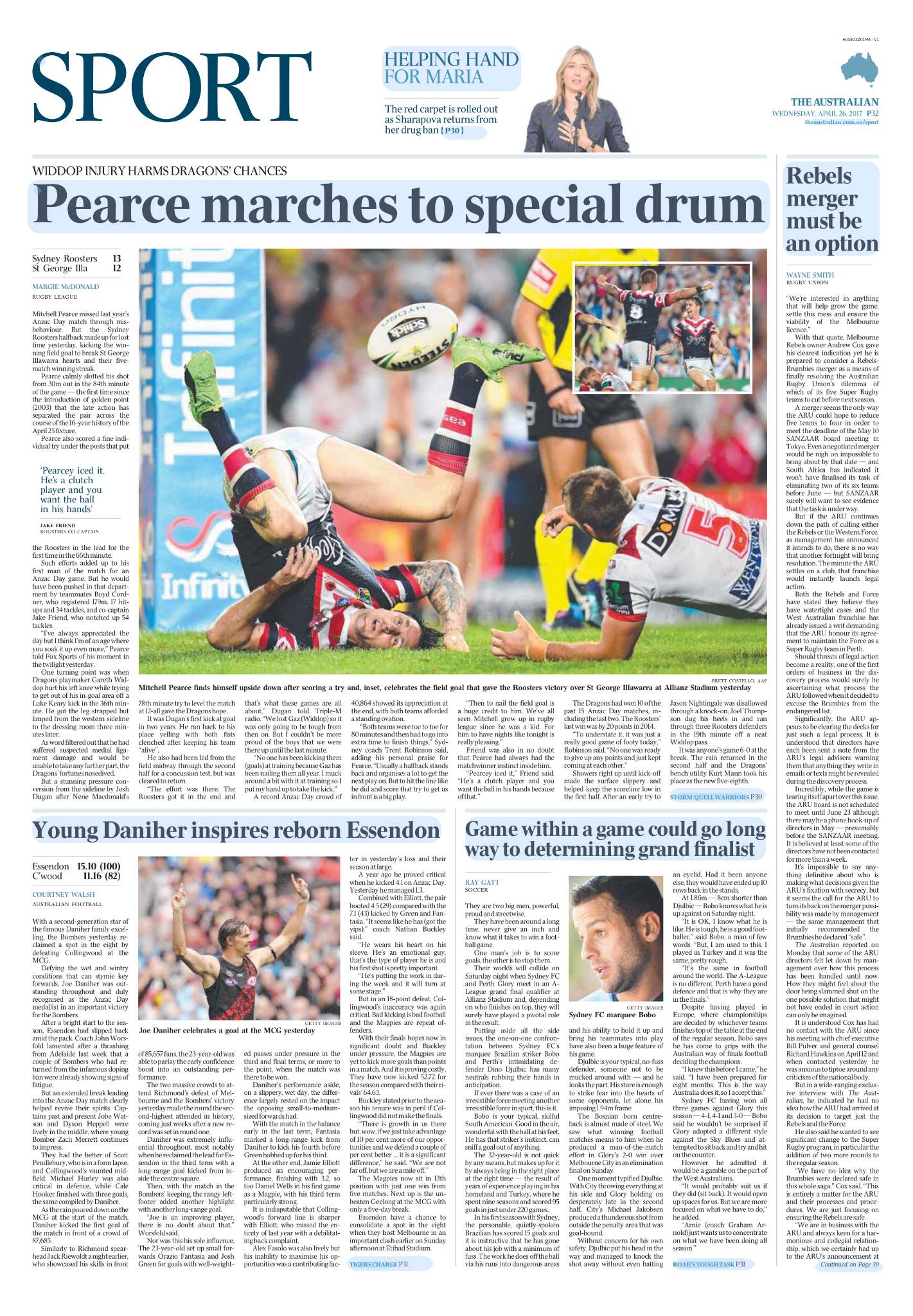 A rugby player wearing a striped jersey and shorts, lying on the ground with an injured leg, being attended to during a rugby match. Other players and officials can be seen in the background.