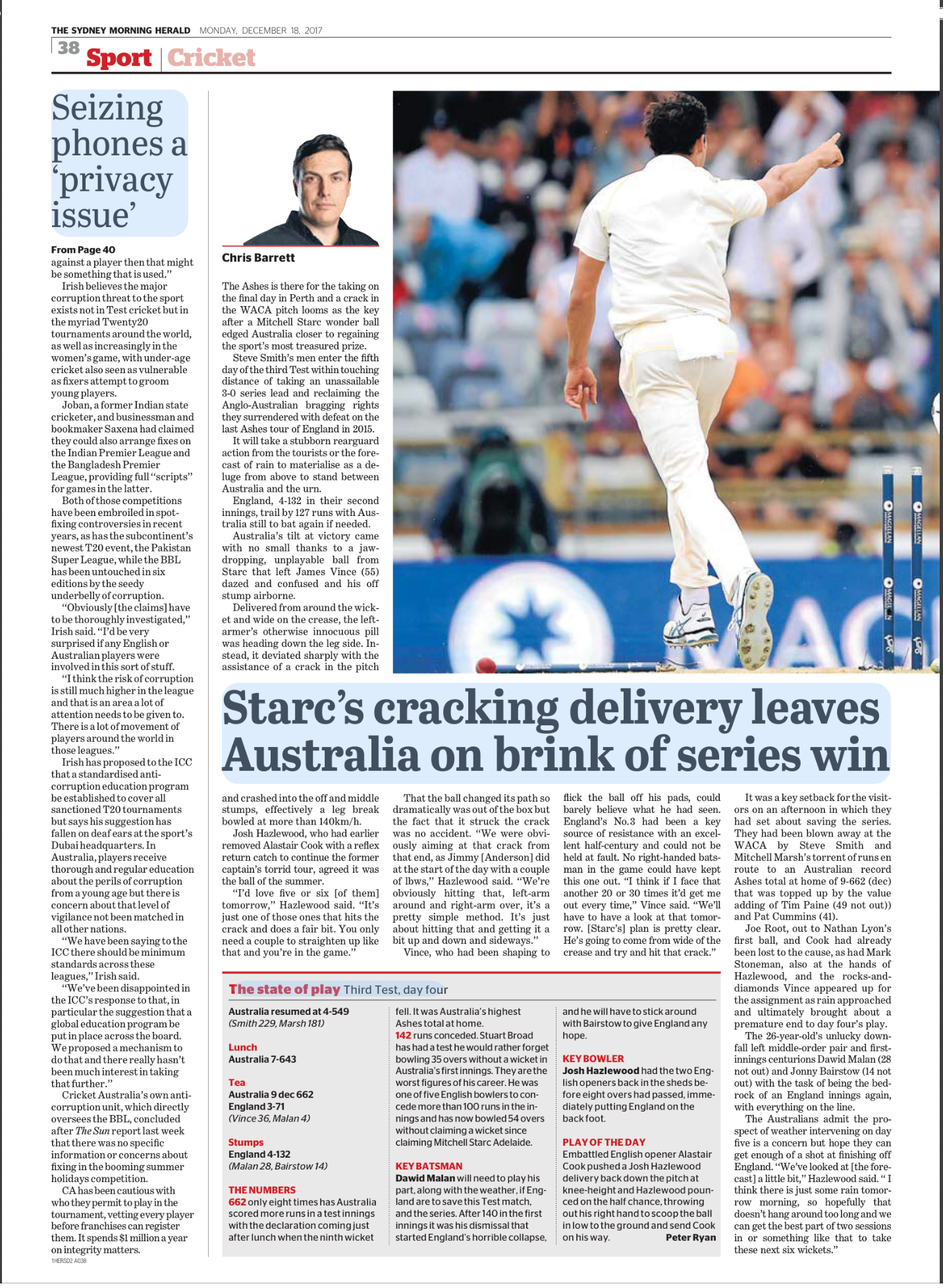 A cricket player in white uniform on the field, with his back to the camera, pointing and walking away from the audience.