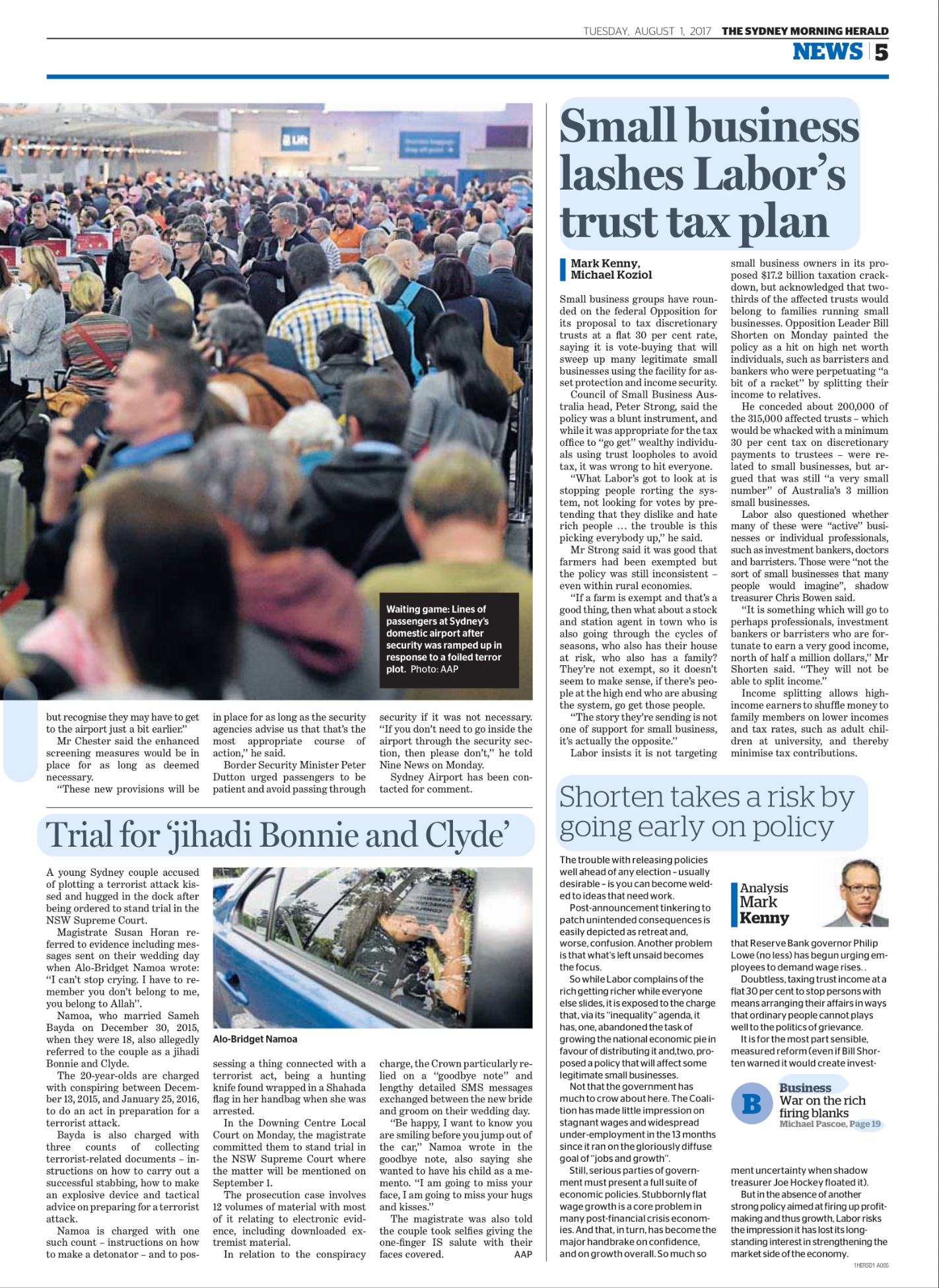 Crowded line of passengers waiting at Sydney's airport security after a terror threat scare, with signage indicating flights and security checkpoints visible in the background.
