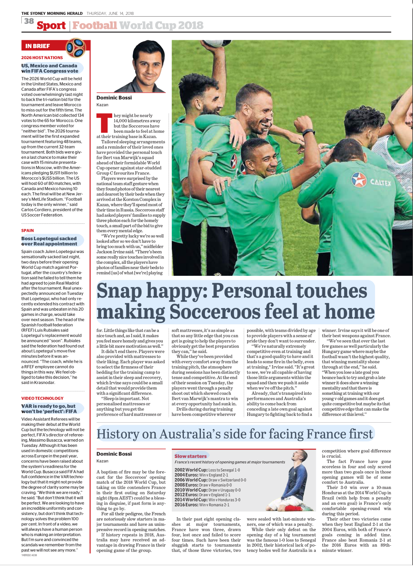 Newspaper sports article from The Sydney Morning Herald about soccer players celebrating on the field, with a headline "Snap happy: Personal touches making Socceroos feel at home".