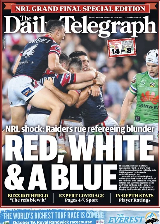 Front page of The Daily Telegraph newspaper featuring rugby players celebrating, with a headline about refereeing controversy and a score of 14-8.