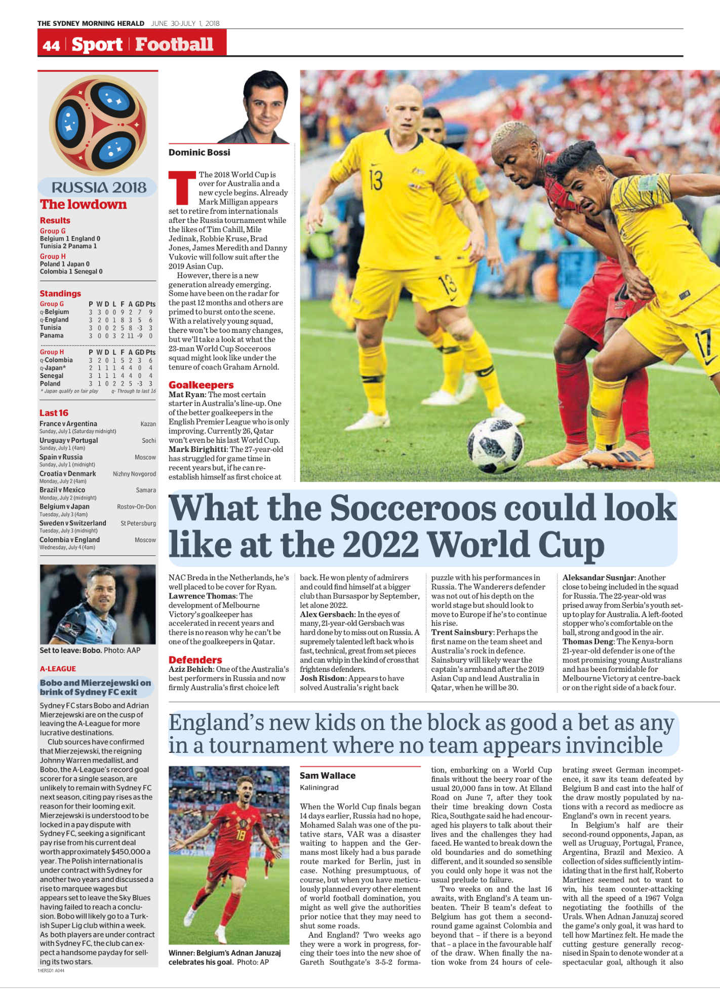 Sports newspaper page with headlines and articles about the 2018 FIFA World Cup, featuring a photo of soccer players in action on the field.