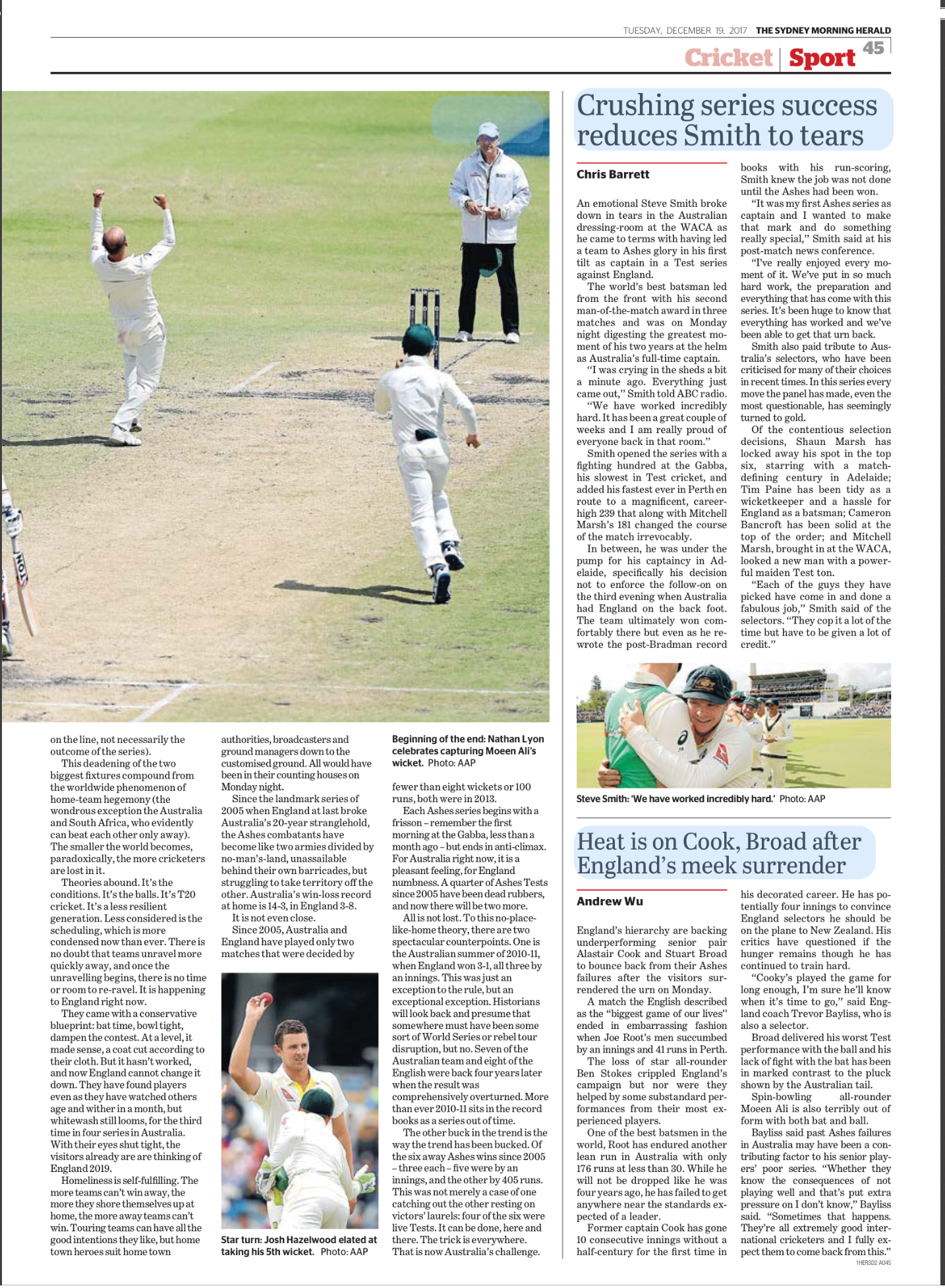 Photograph of cricket players on a field, celebrating a wicket. One player is visibly raising his fist in victory, while another runs towards him, and an umpire stands in the background.