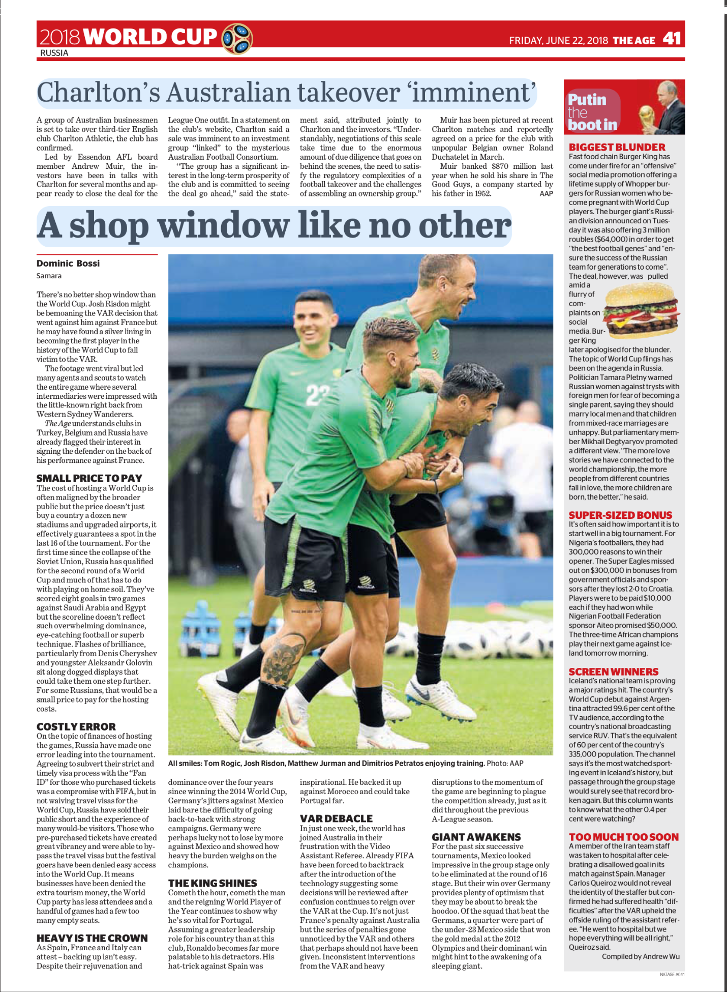 Photograph of the start of a soccer match with players in green uniforms celebrating. The stadium is outdoors with blurred spectators in the background.