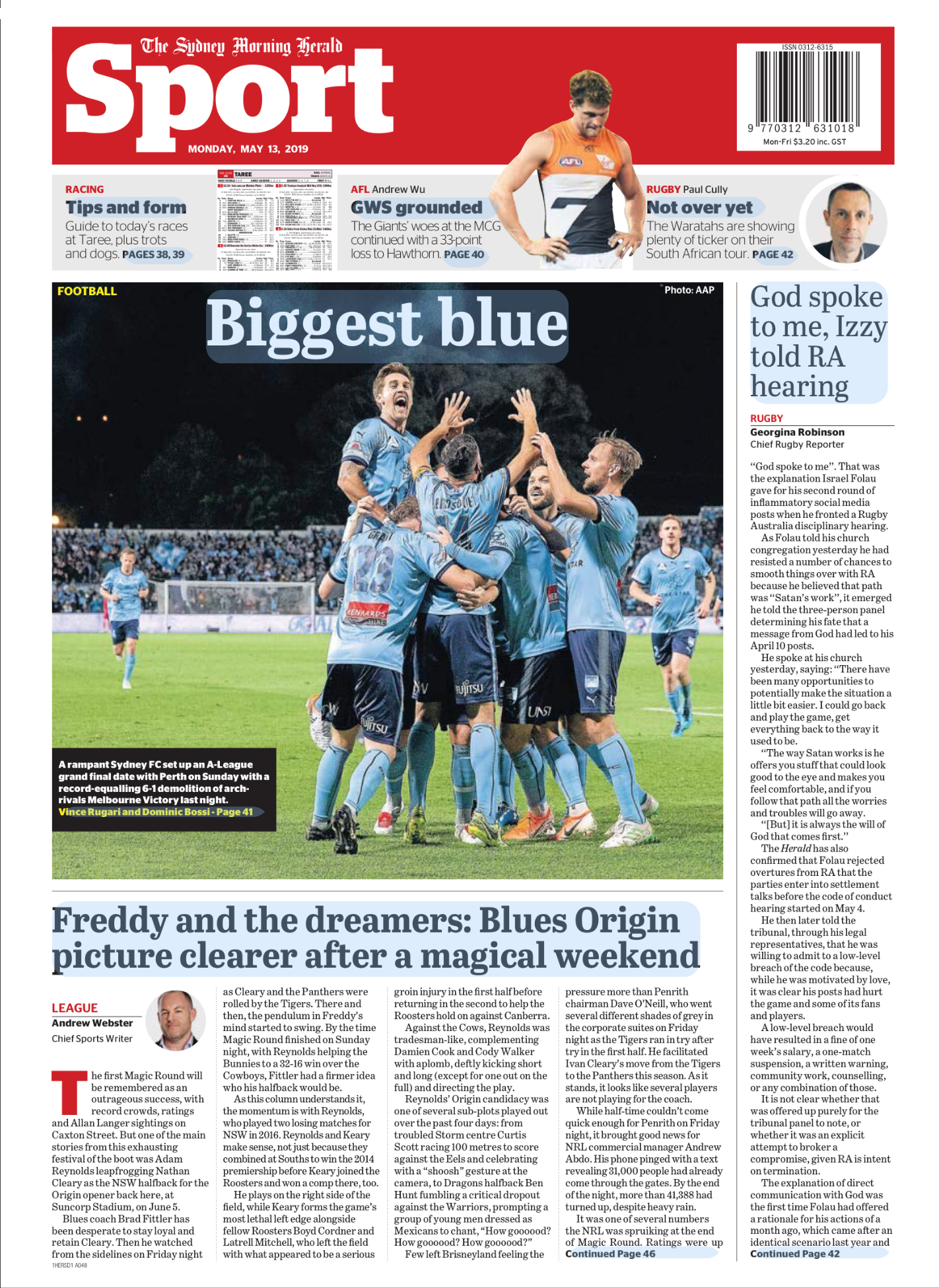 Sydney FC soccer team celebrating on the field after scoring, with players embracing and raising their hands in victory.