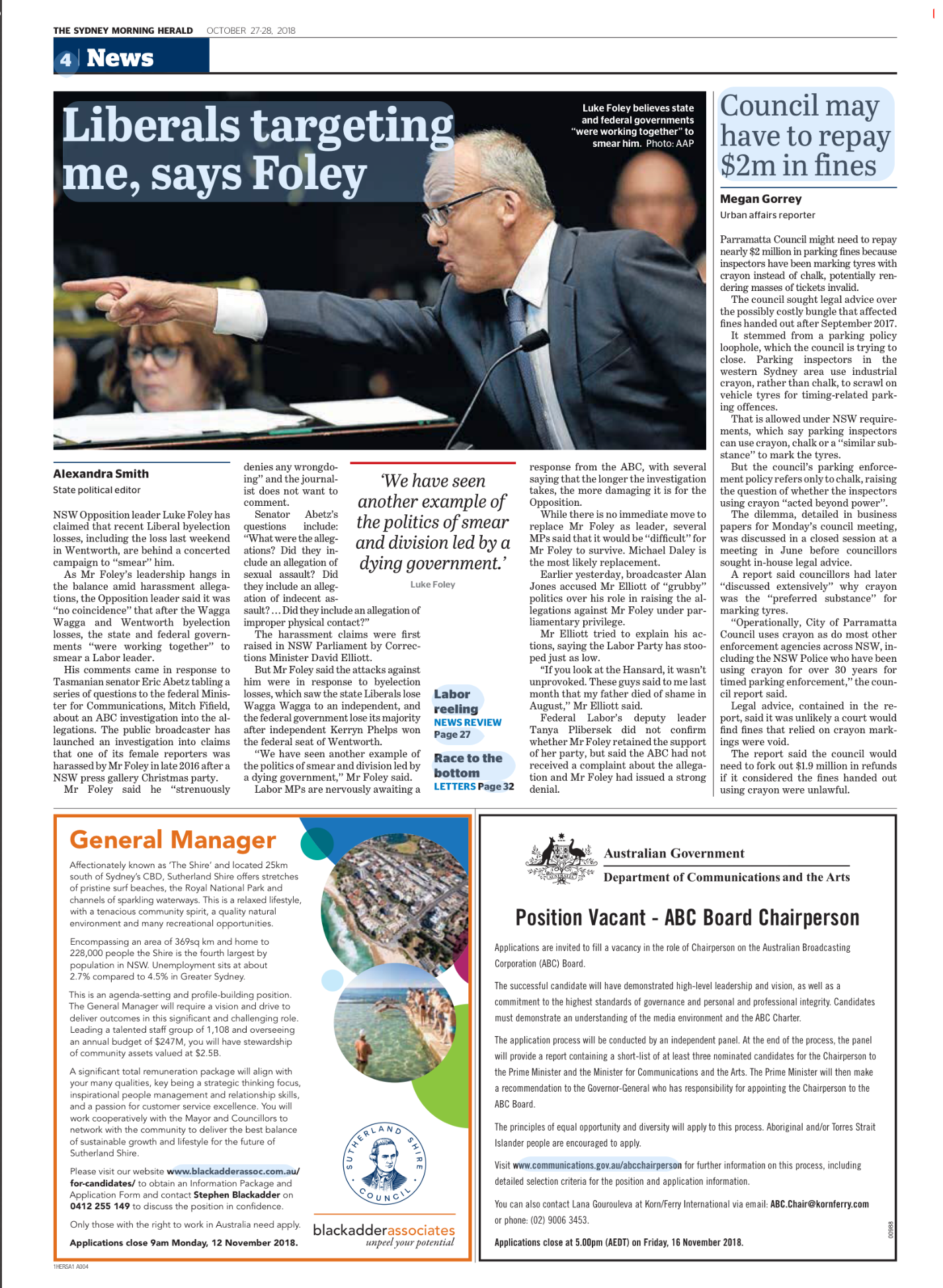 Newspaper page featuring a photo of Luke Foley in a suit, pointing with his right arm, with a woman and another person blurred in the background. Headlines discuss Foley claiming targeting by liberals and an article about council fines. Additional se