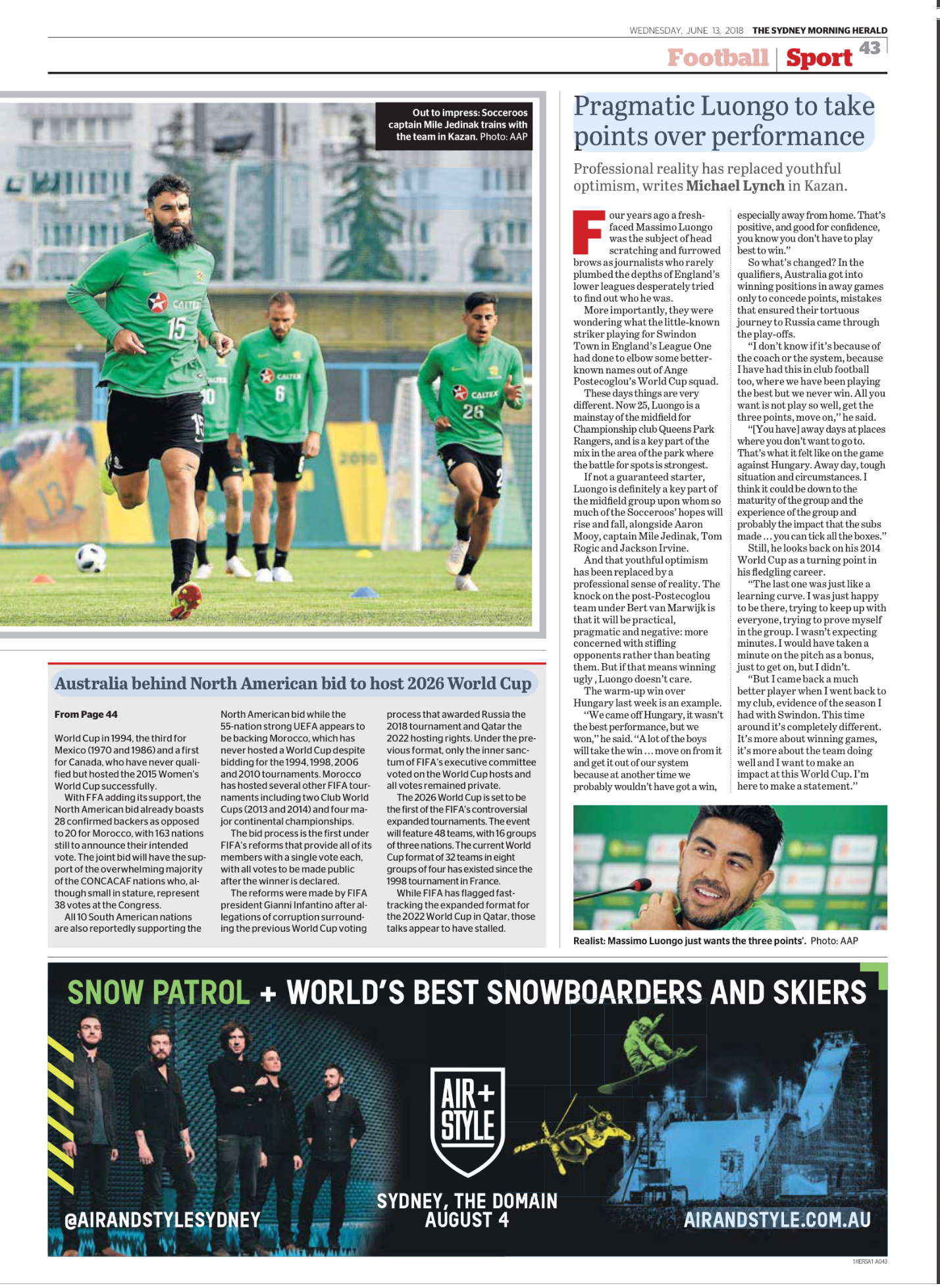 Photograph of four soccer players in green jerseys during training on a field, with the captain Mile Jedinak leading.