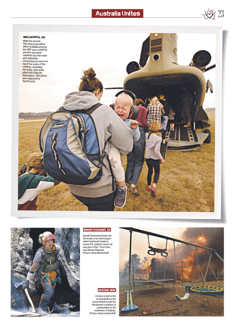 A woman with a backpack helping children onto a large military helicopter with a group of children. Others are climbing the helicopter stairs or waiting nearby. The scene appears to be an outdoor event on a grassy field.