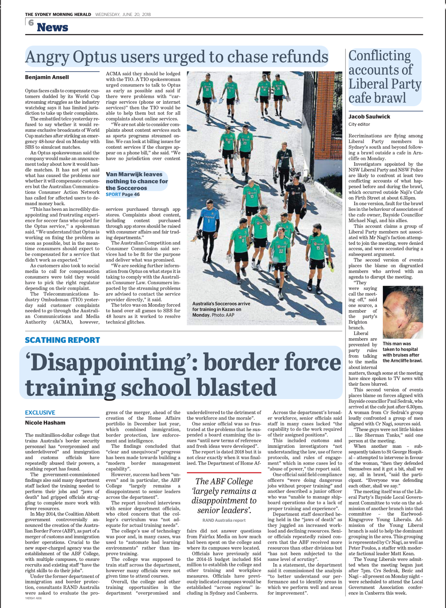 A newspaper page featuring a photo of Australia's Socceroos team walking together for training in Kazan, with headline about angry Optus users, and articles about political conflicts and border force training.